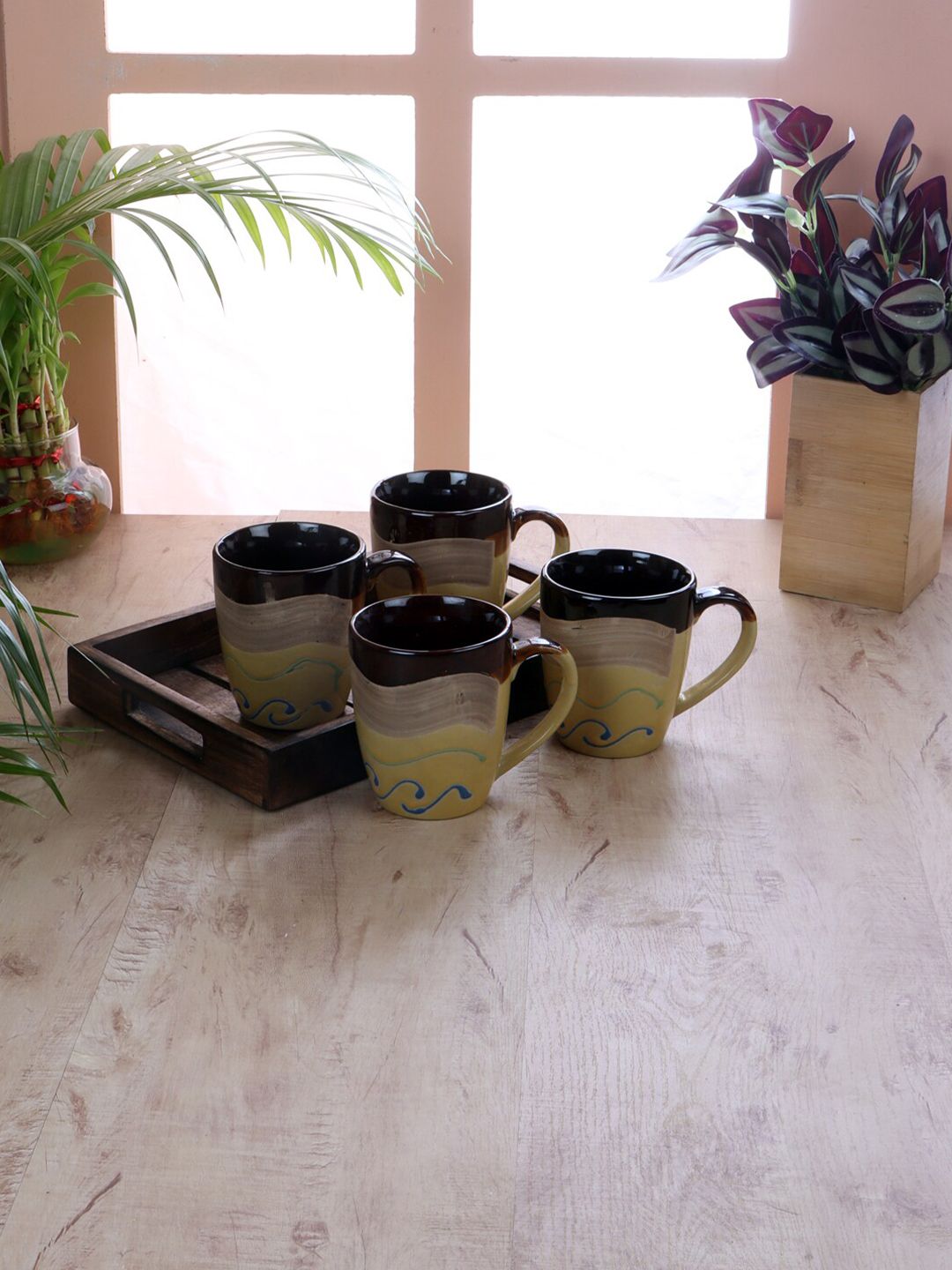 CDI Set Of 4 Cream-Coloured & Brown Printed Ceramic Glossy Mugs With Wooden Tray Price in India