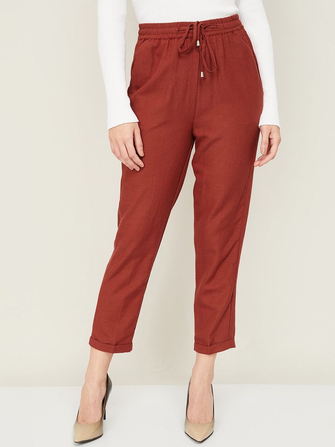 Bossini Women Brown Solid Regular Cropped Trousers Price in India