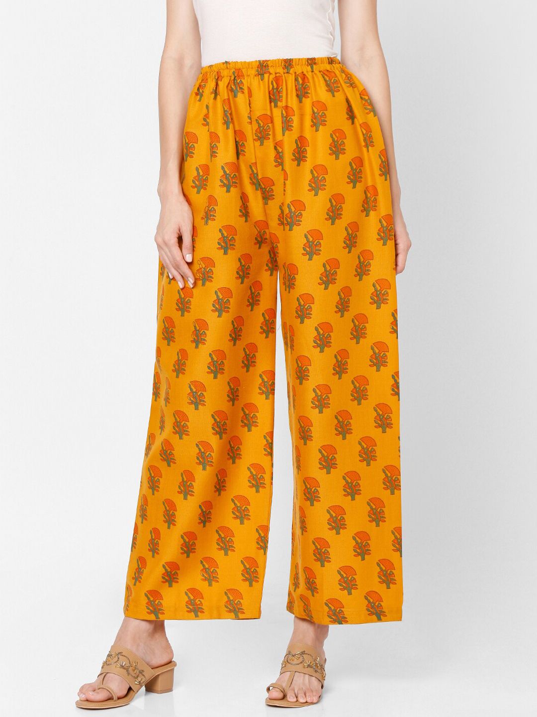 SALWAR STUDIO Women Yellow & Orange Floral Printed Knitted Ethnic Palazzos Price in India