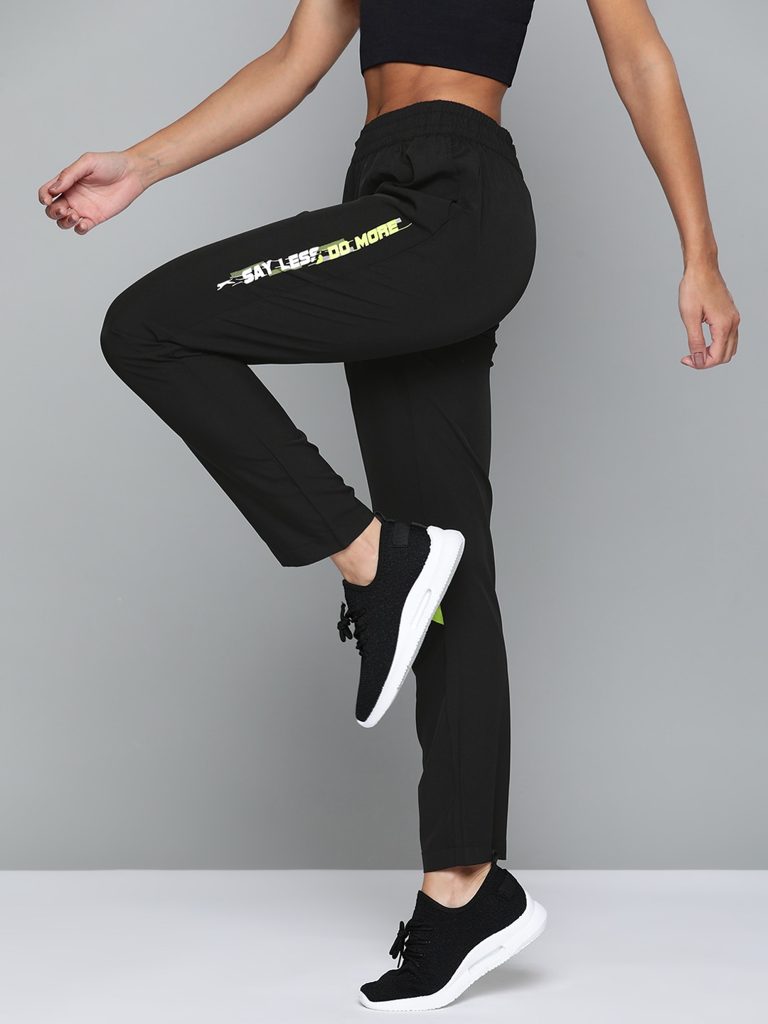 Slazenger Women Black Solid Track Pants With Stripe Detail Price in India