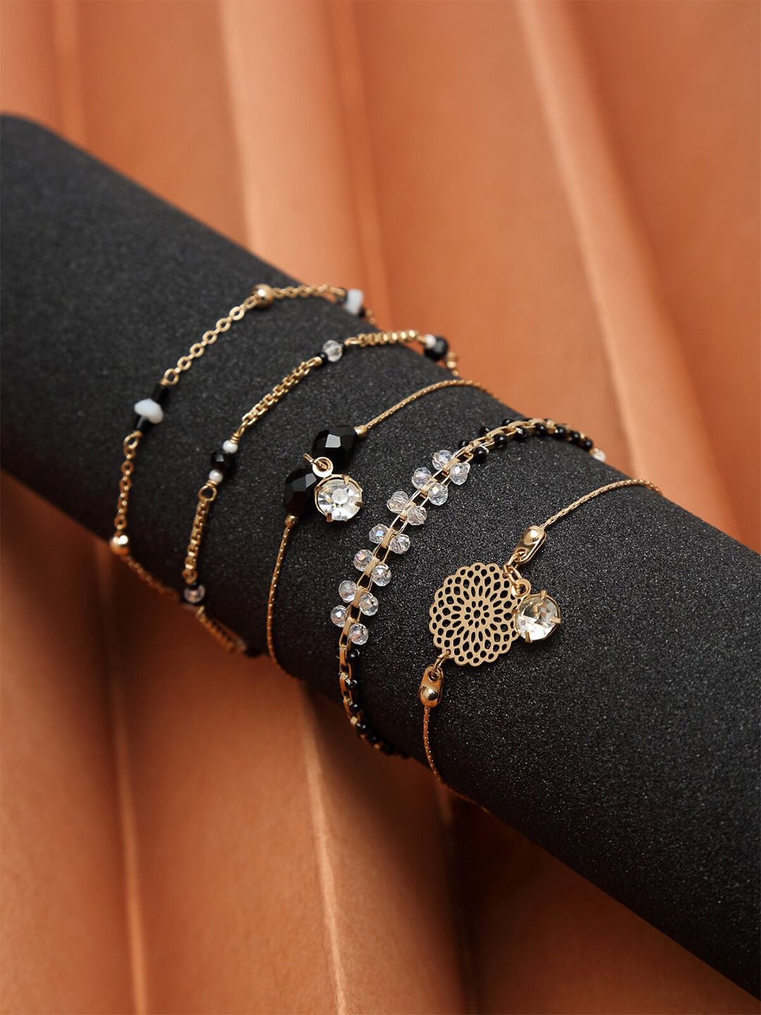 Madame Women 5 Rose Gold & Black Rose Gold-Plated Link Bracelet Price in India