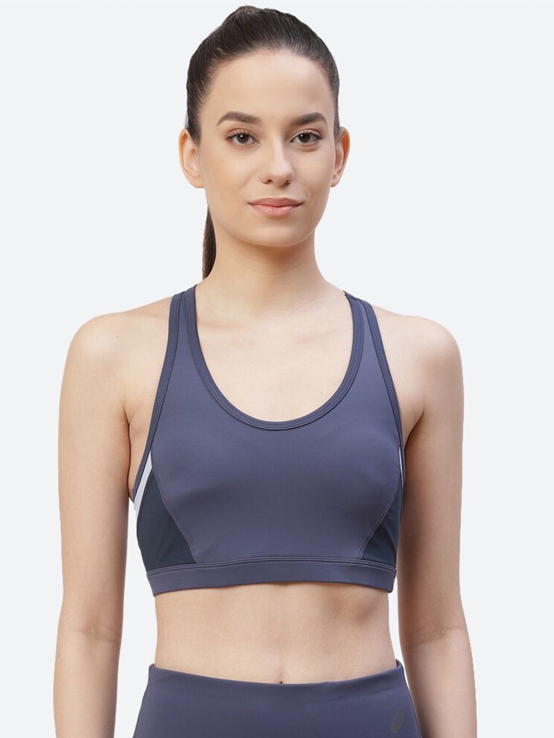 ASICS Women Blue solid Sports Bra Price in India