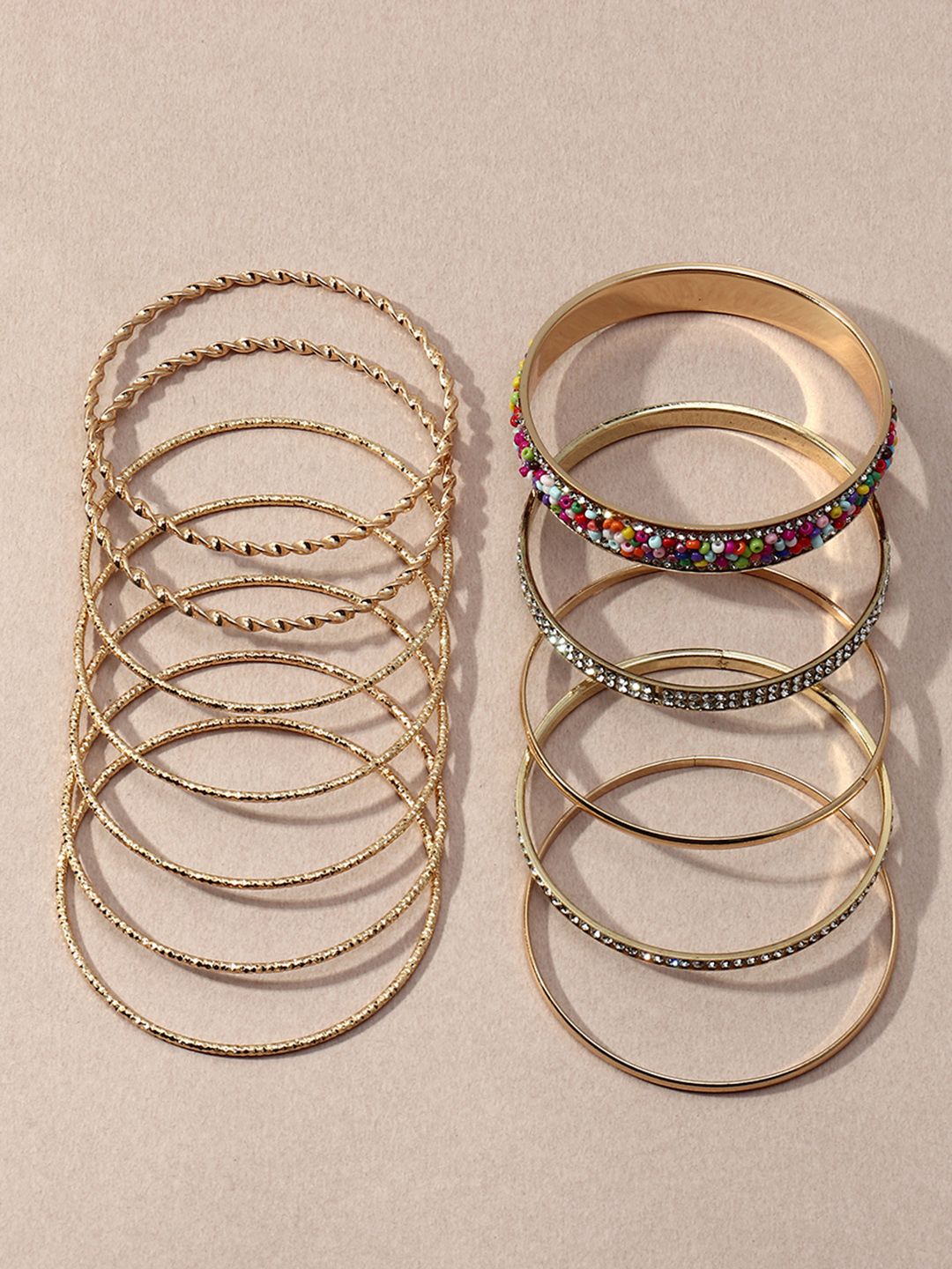 URBANIC Women Pack of 12 Gold-Toned Bangle-Style Bracelet Price in India