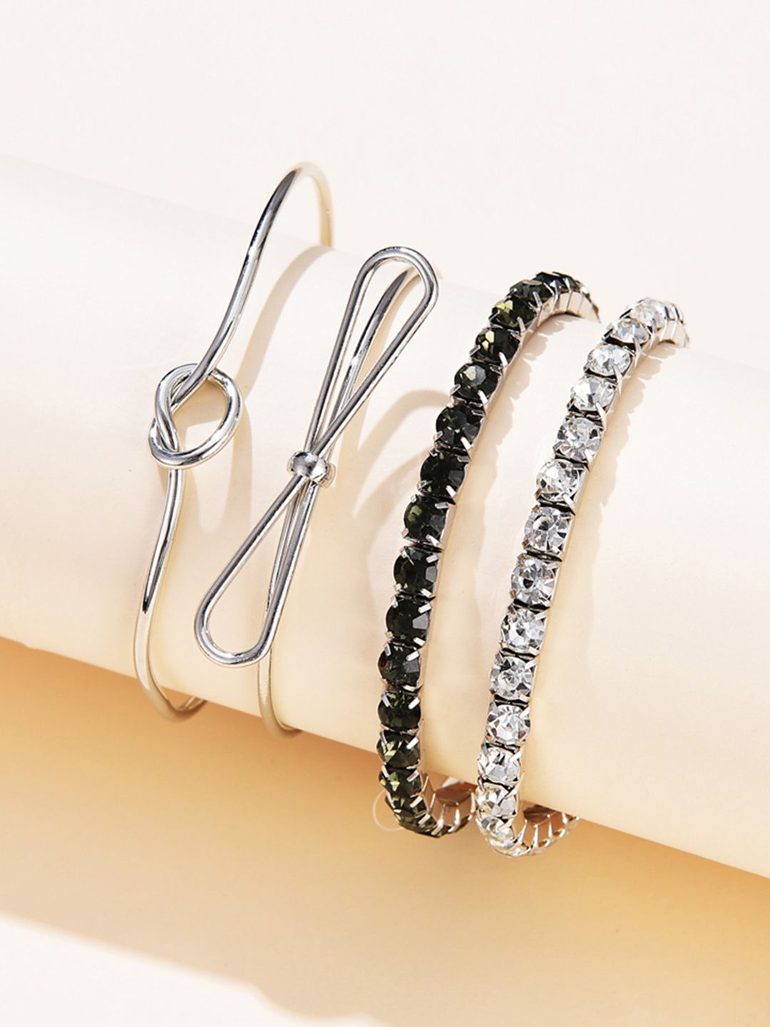 URBANIC Women Set of 4 Silver-Toned & Black Cuffed and Elasticated Bracelet Price in India
