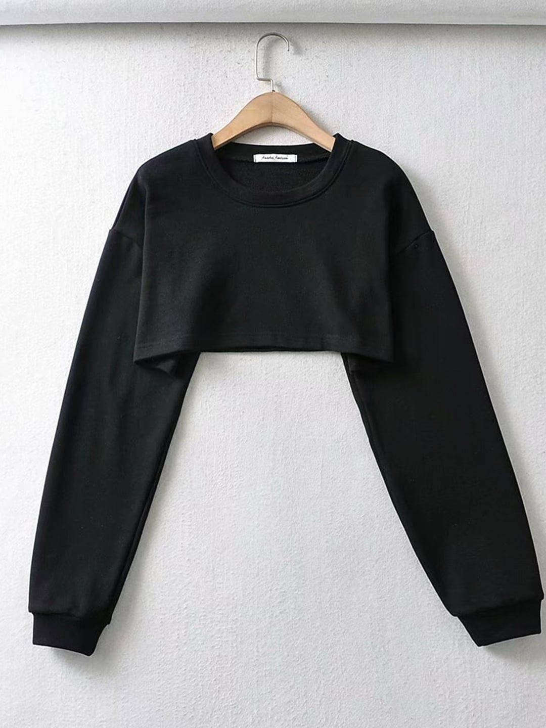 URBANIC Women Black Solid Pure Cotton Crop Sweatshirt Price in India