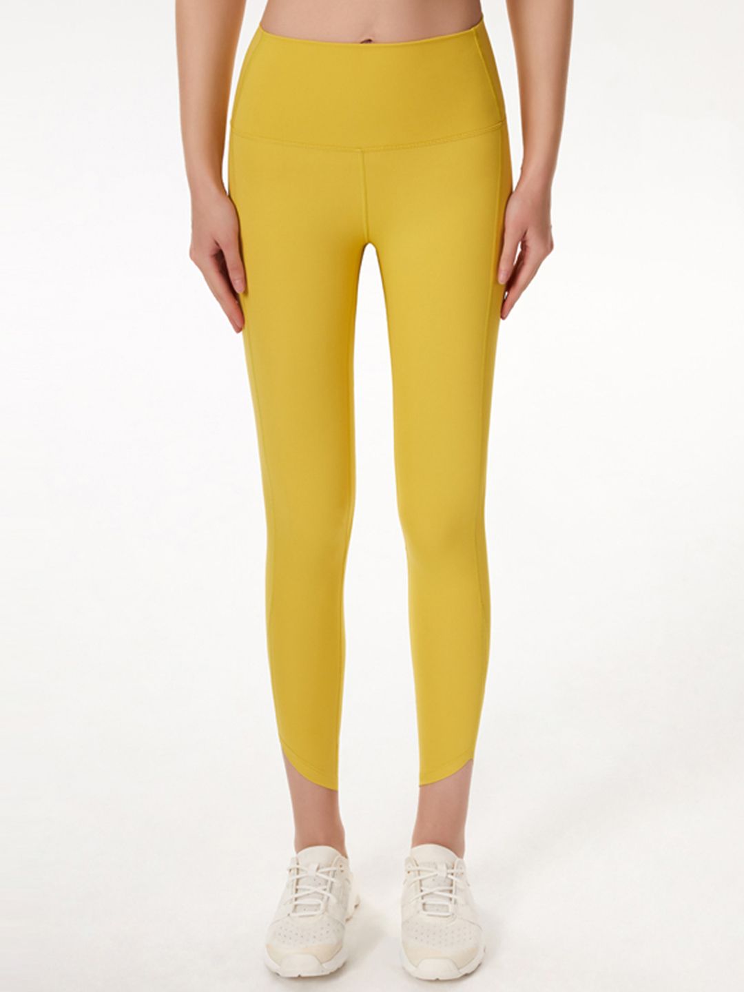 URBANIC Women Mustard Yellow Solid Cropped Mesh Gym Tights Price in India