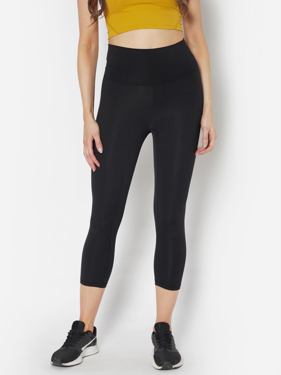 URBANIC Women Black Solid High-Rise 3/4th Gym Tights Price in India