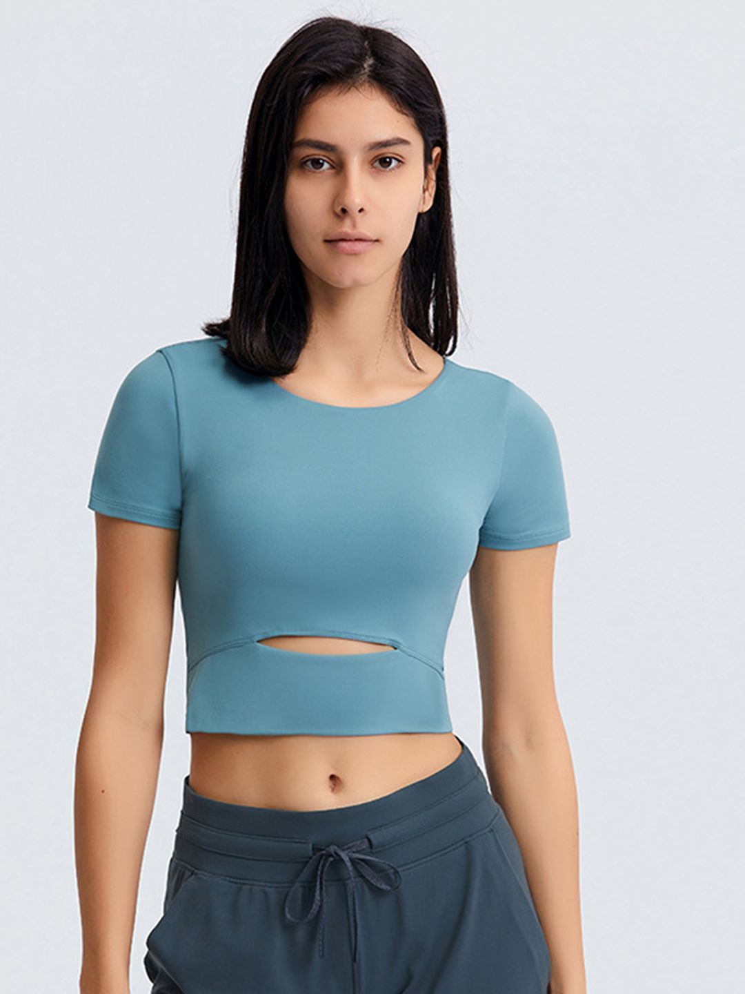 URBANIC Women Blue Solid Cut Out T-Shirt Price in India