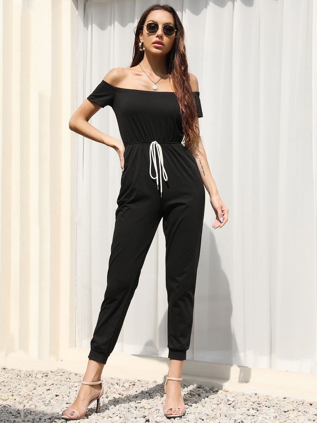 URBANIC Women Black Solid Off-Shoulder Waist Tie-Up Basic Cropped Jumpsuit Price in India