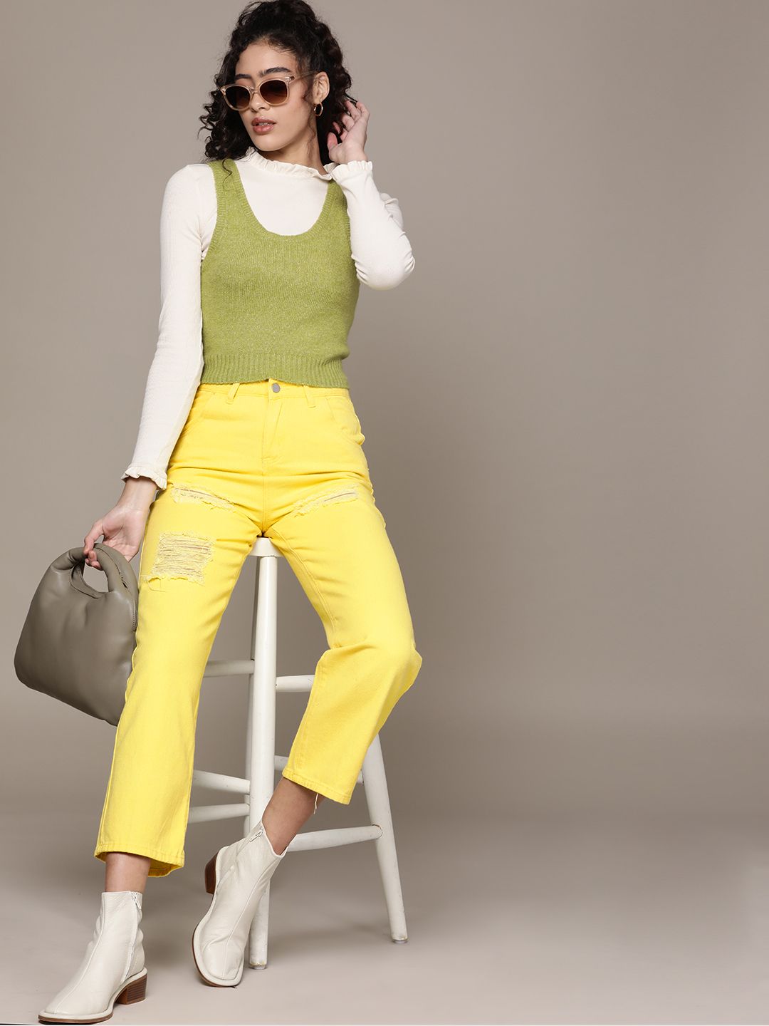 URBANIC Women Yellow Cotton Relaxed Fit Mildly Distressed Stretchable Jeans Price in India