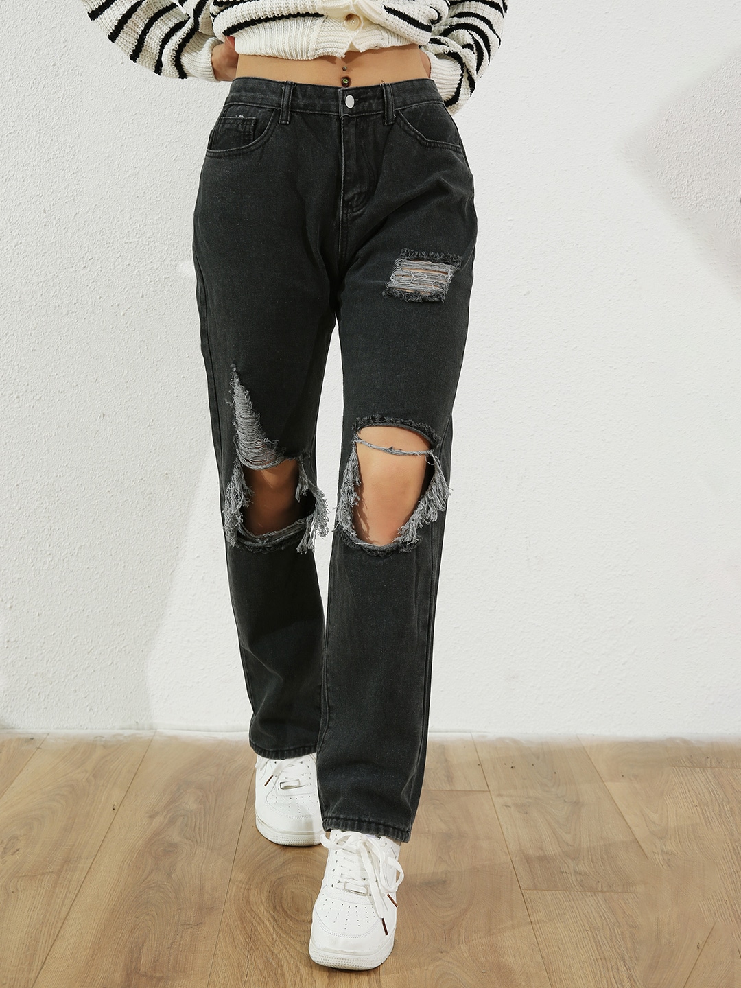 URBANIC Women Black Slash Knee Light Fade Stretchable Ripped Straight Leg Jeans Price in India