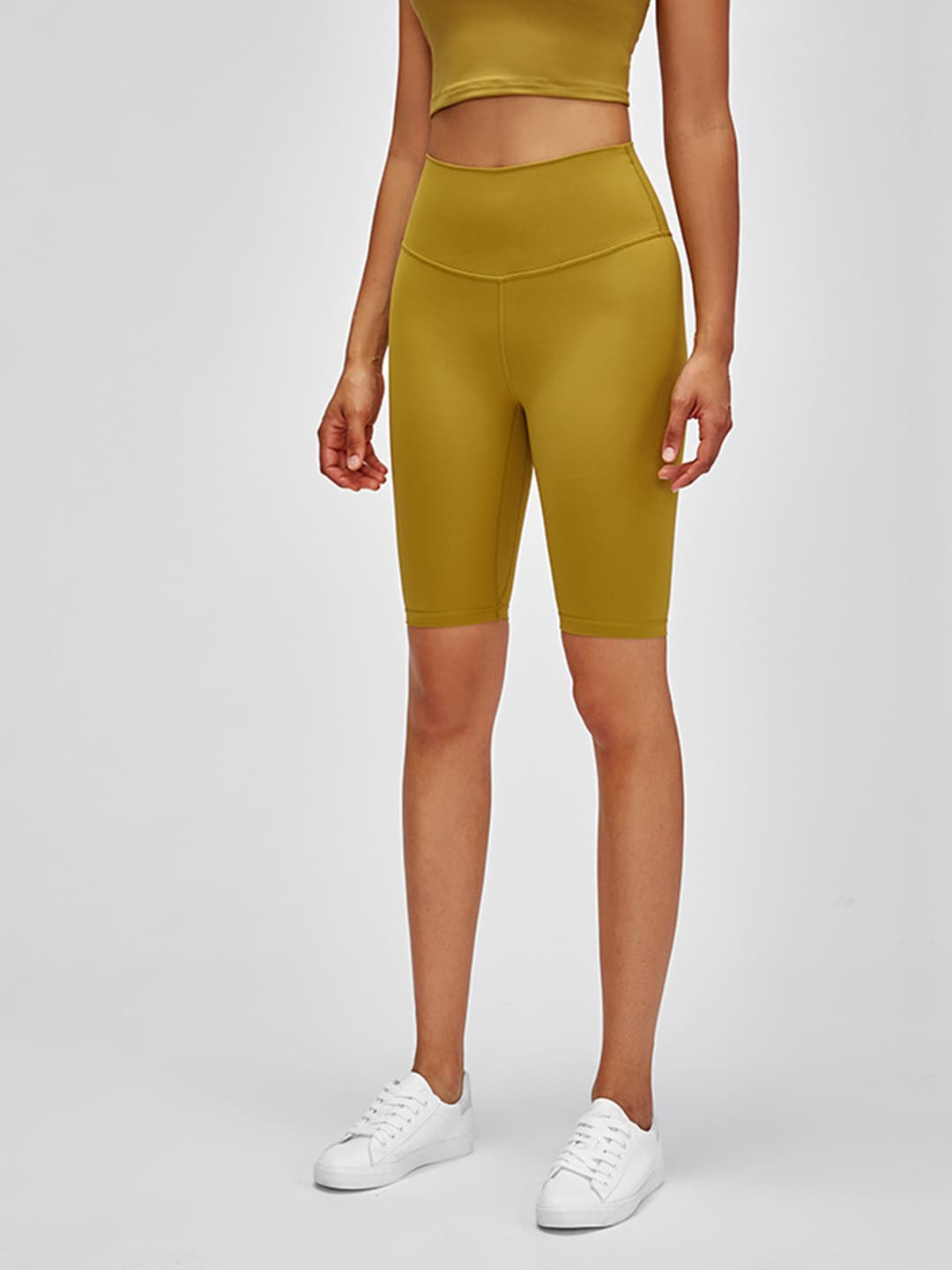 URBANIC Women Mustard Yellow Slim Fit High-Rise Gym Biker Shorts Price in India