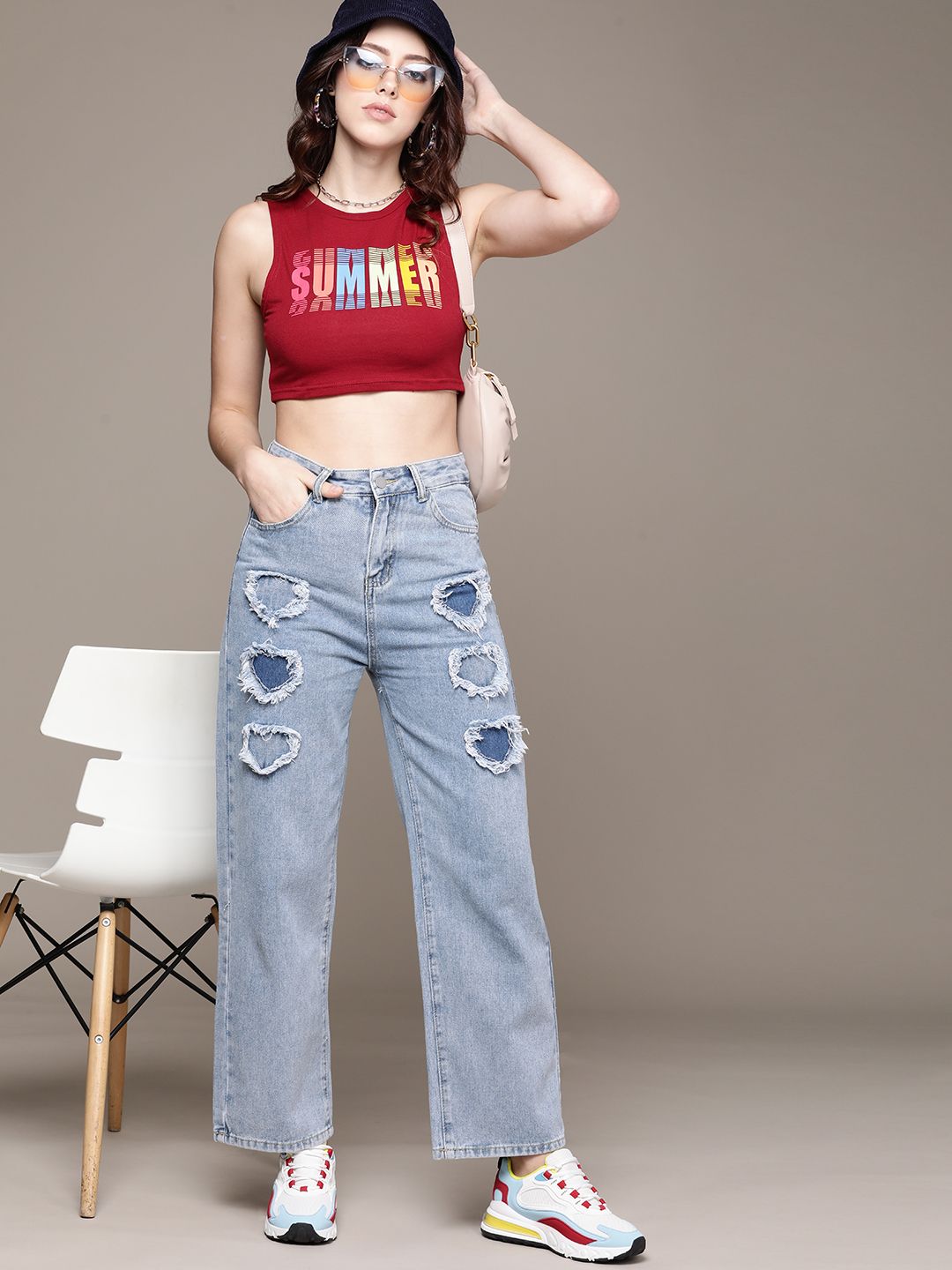 URBANIC Women Blue Cotton Relaxed Fit Mildly Distressed Light Fade Cropped Jeans Price in India