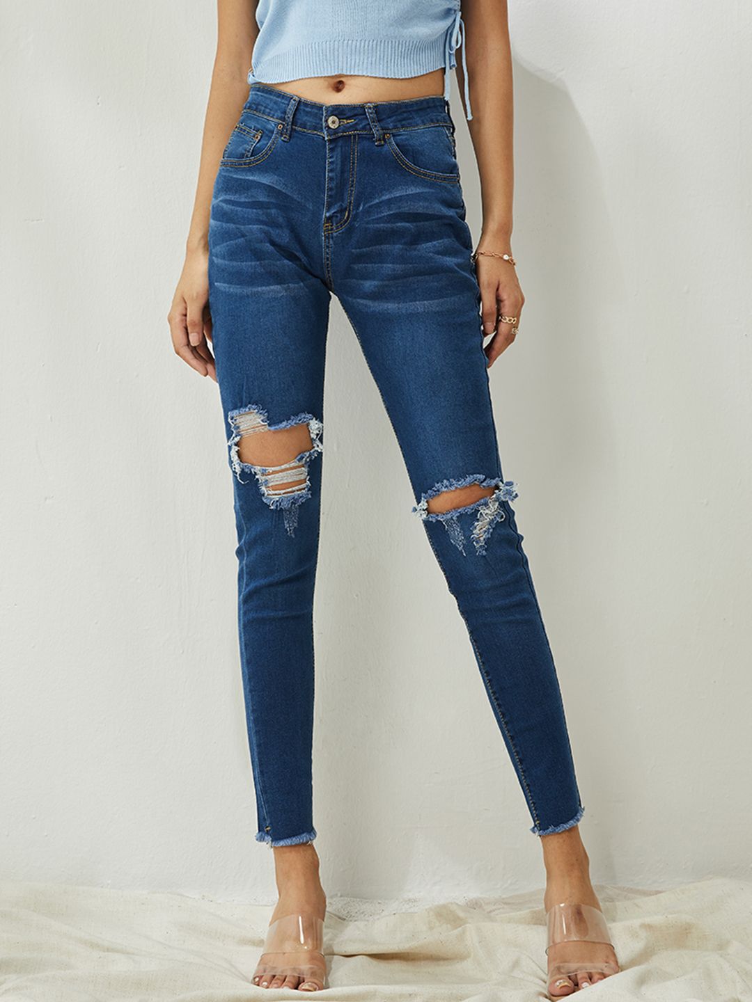 URBANIC Women Blue Slim Fit Highly Distressed Light Fade Stretchable Jeans Price in India