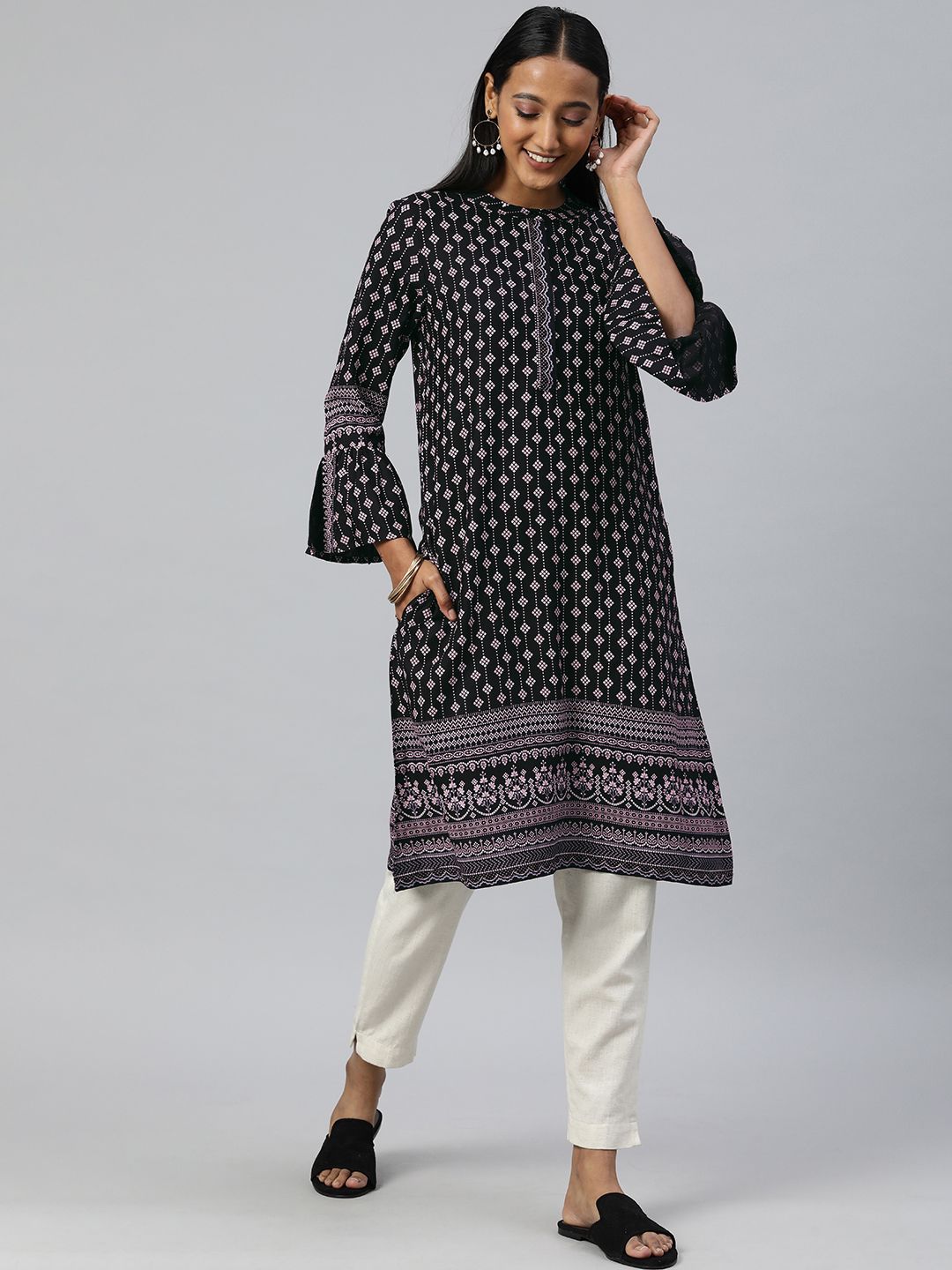 Global Desi Women Black & White Bandhani Printed Bell Sleeves Kurta Price in India