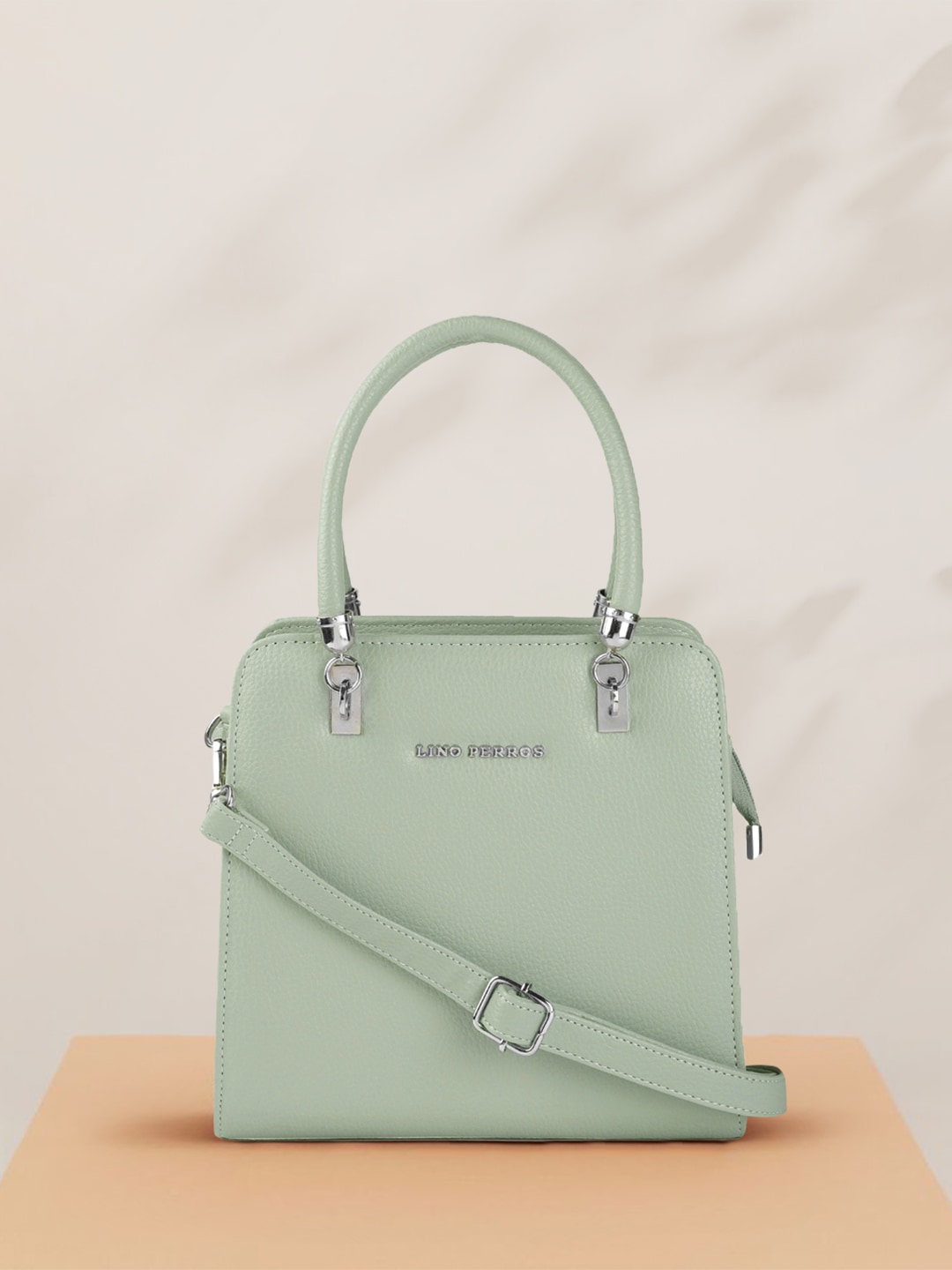 Lino Perros Sea Green Solid Structured Handheld Bag Price in India