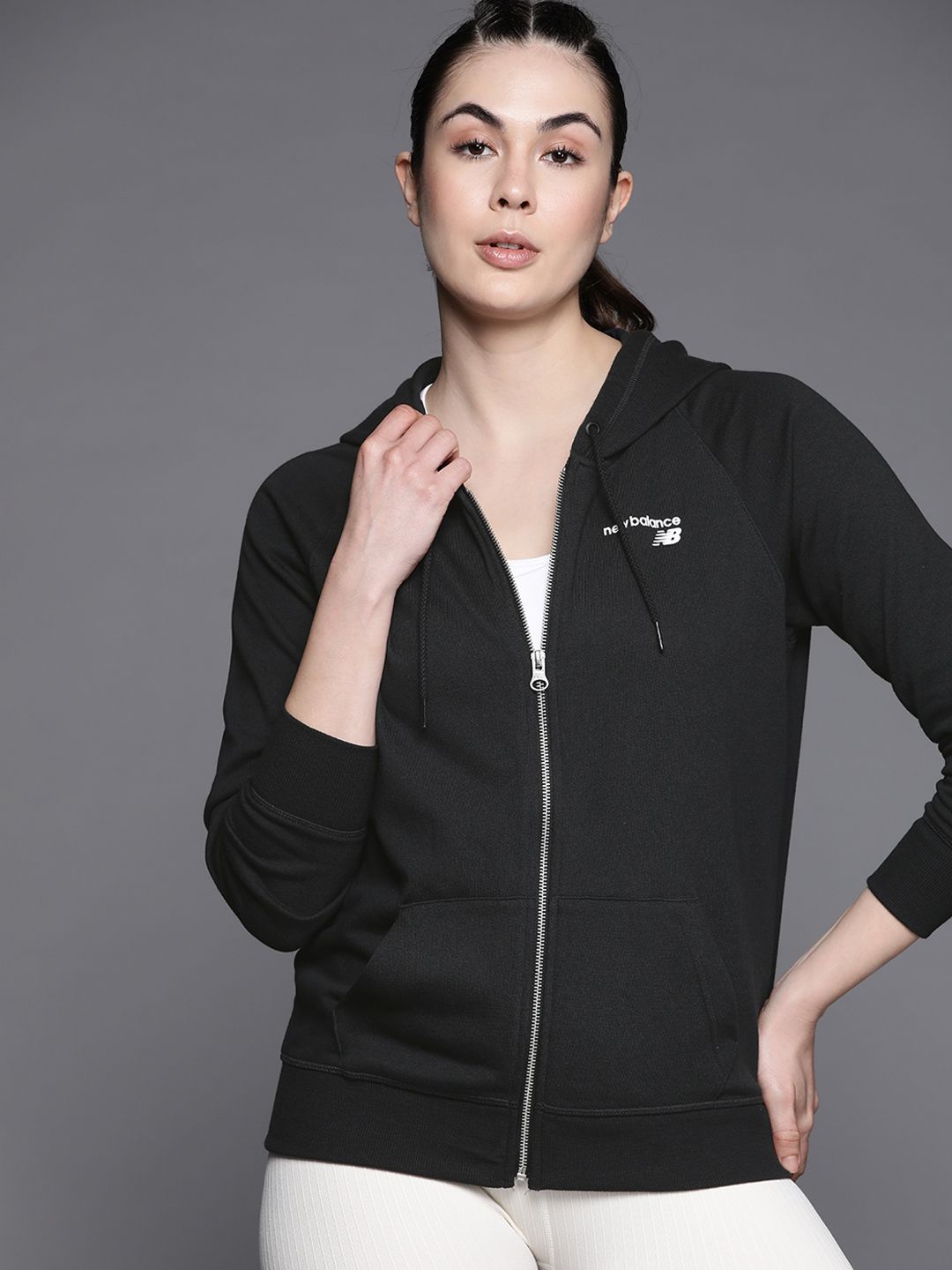 New Balance Women Black Solid Hooded Sweatshirt Price in India