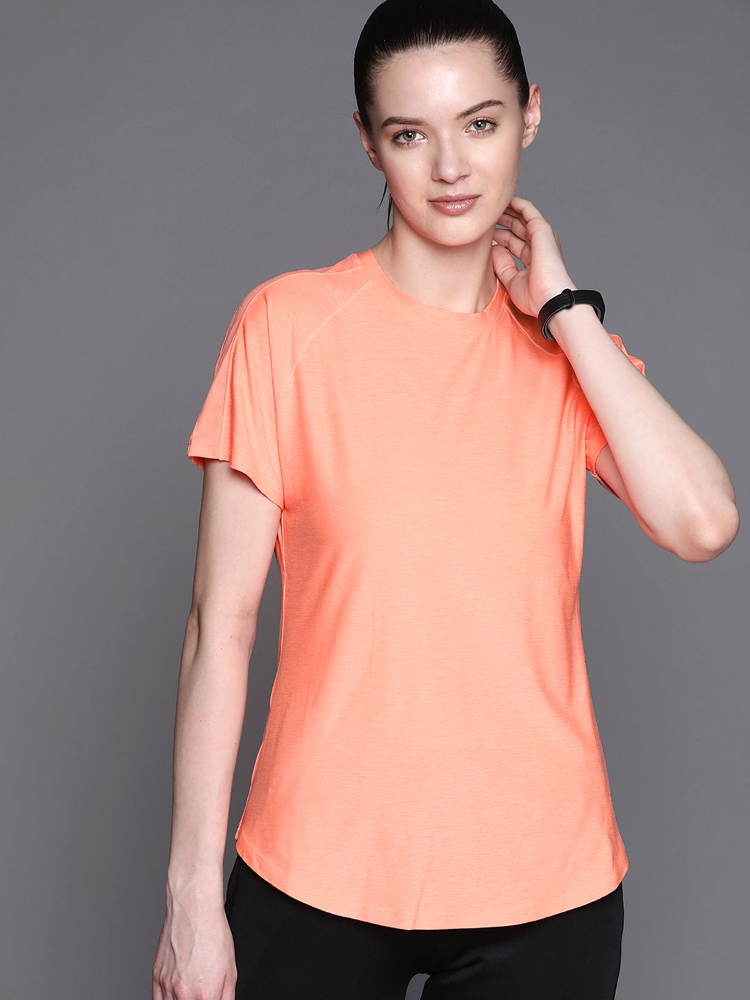 New Balance Women Peach-Coloured Solid T-shirt Price in India