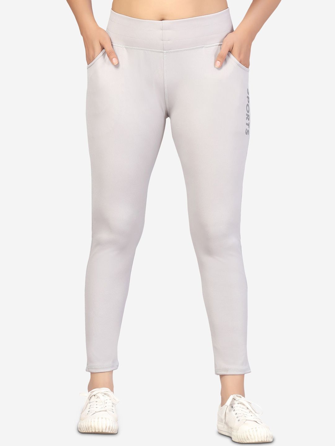 Aarika Women Cream Solid Rapid-Dry Training Track Pants Price in India