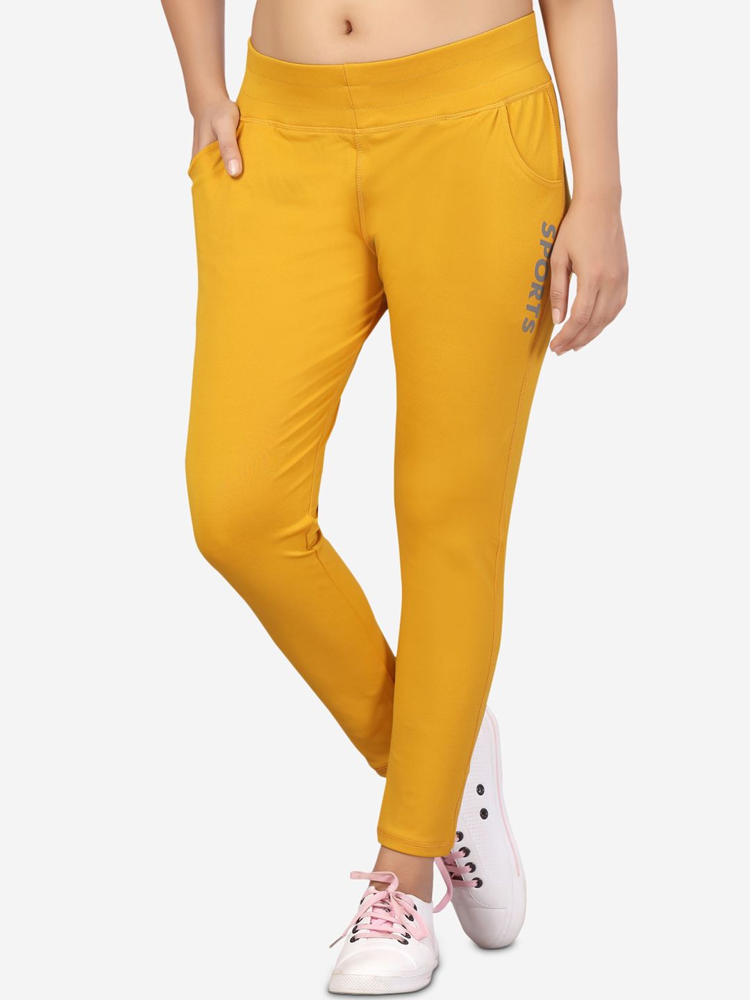 Aarika Women Yellow Solid Rapid-Dry Track Pants Price in India