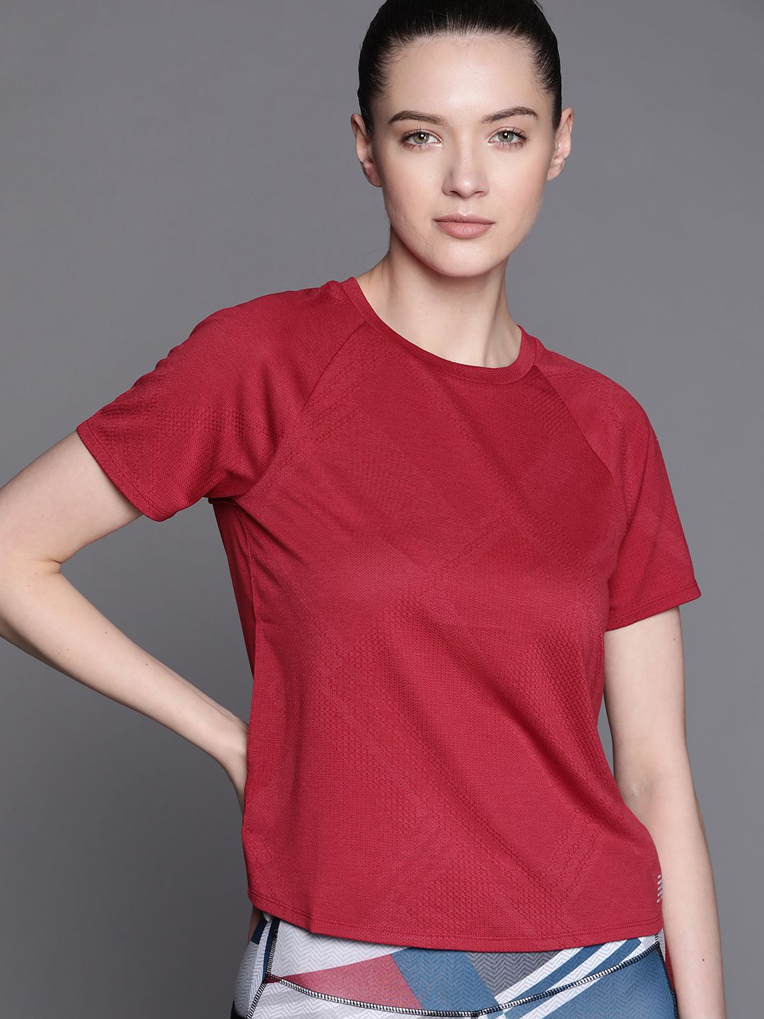 New Balance Women Maroon Solid T-shirt Price in India