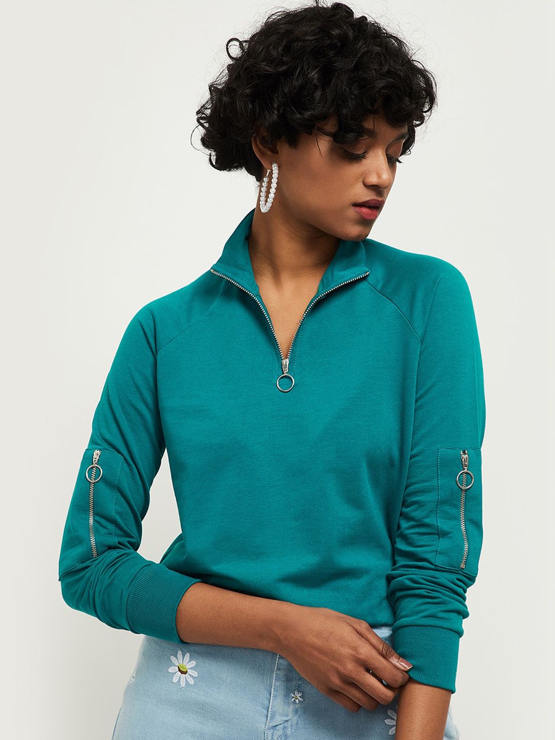 max Women Green Solid Sweatshirt Price in India
