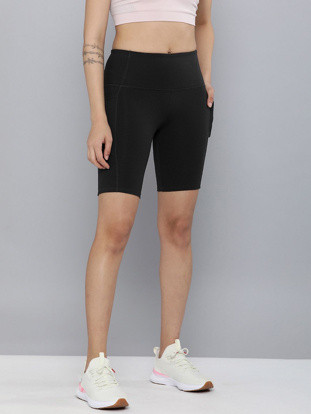 Skechers Women Black Solid High-Rise Goflex Walk Shorts Price in India