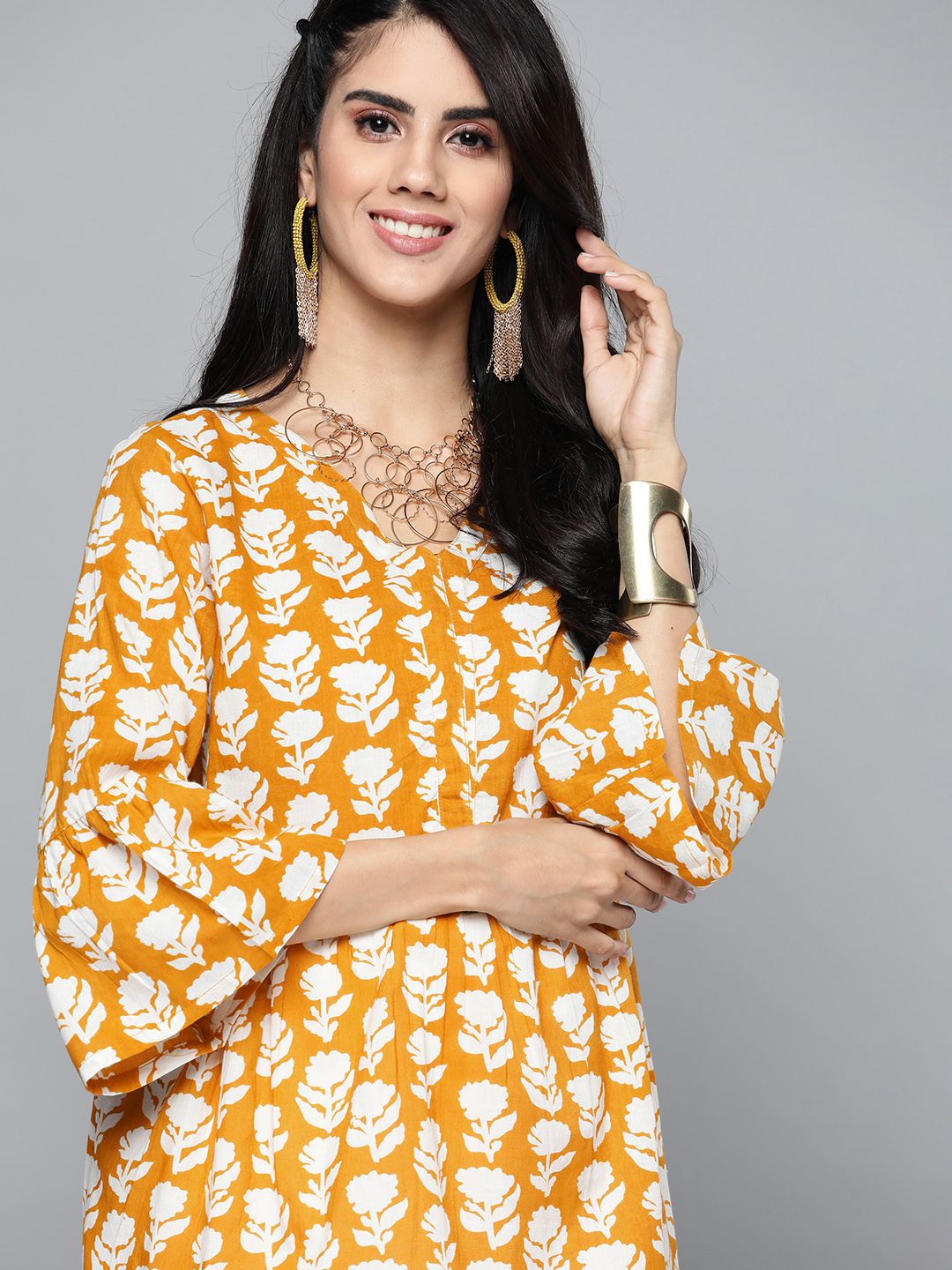 HERE&NOW Mustard Yellow & Off White Pure Cotton Printed V-Neck Kurti Price in India