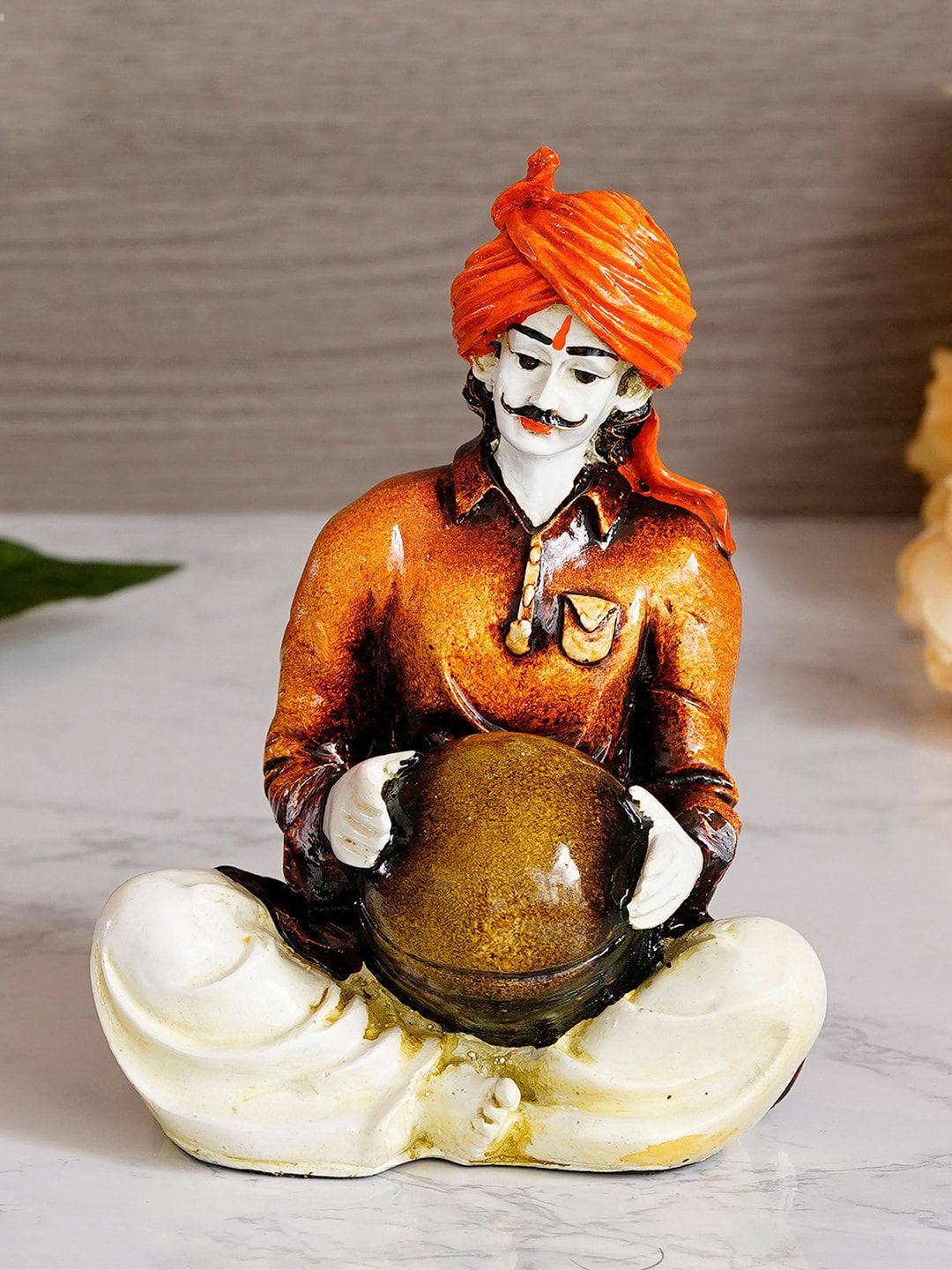 eCraftIndia Orange & Brown Handcrafted Rajasthani Man Showpiece Price in India