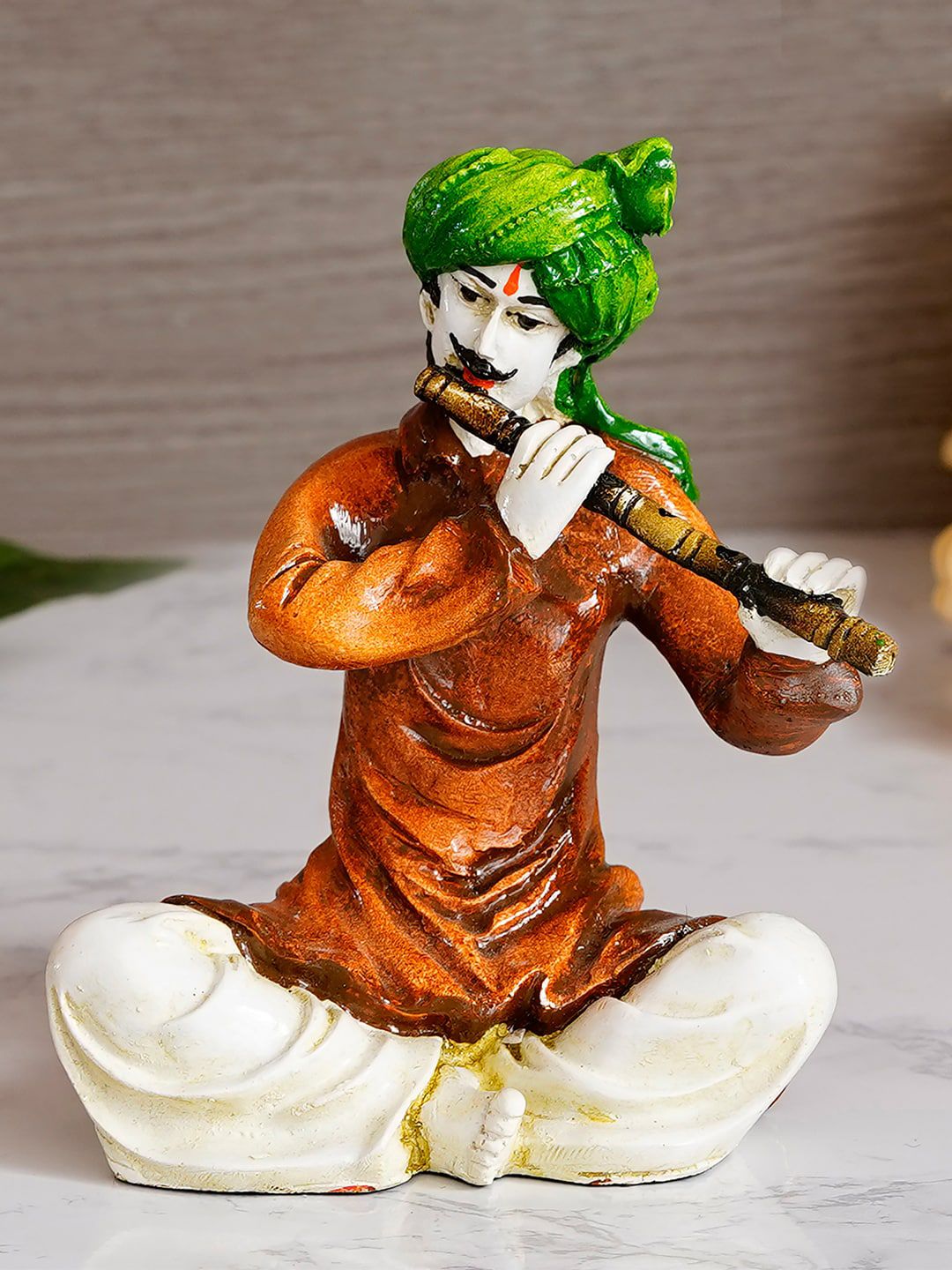 eCraftIndia Green & Brown Handcrafted Rajasthani Man Playing Flute Showpiece Price in India