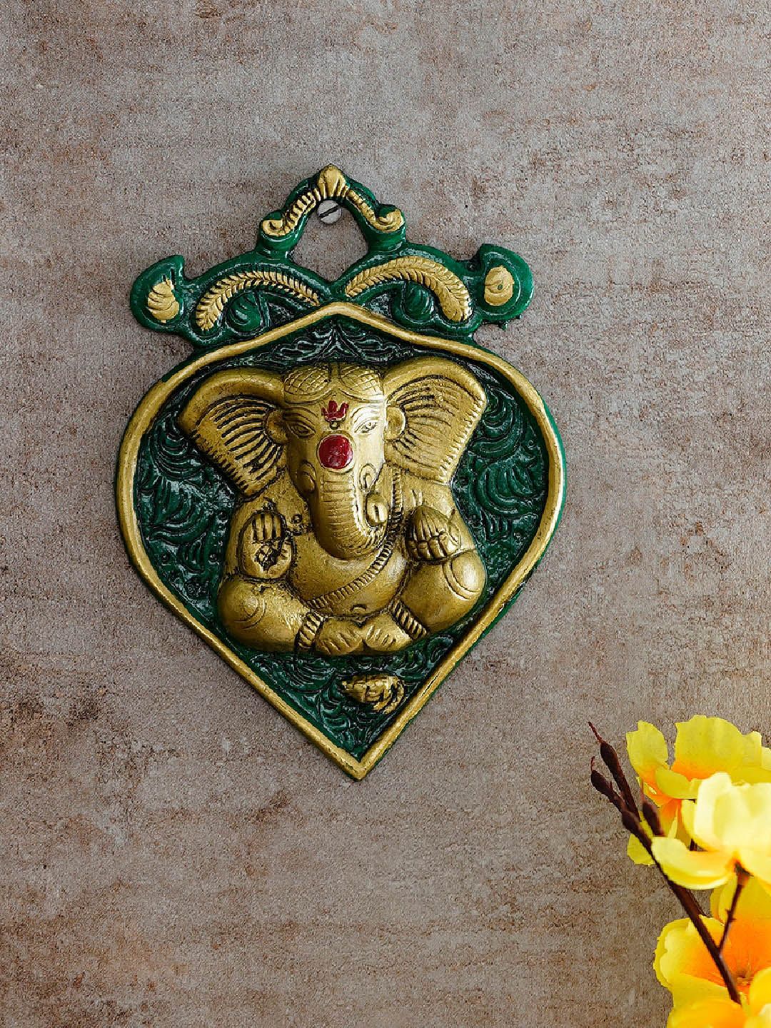 eCraftIndia Green Golden Lord Ganesha on Leaf Handcrafted Metal Wall Hanging Price in India