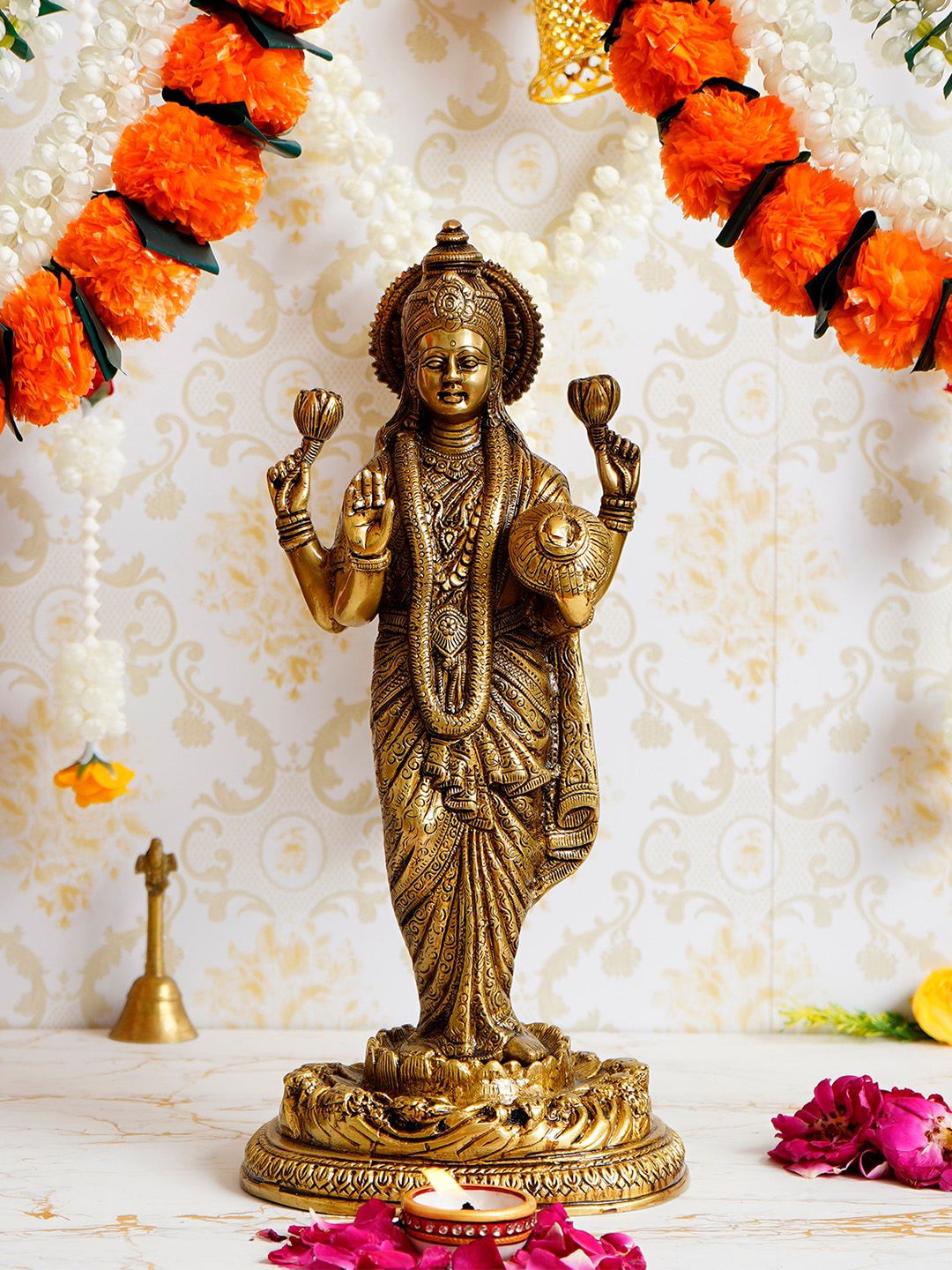 eCraftIndia Gold-Toned Handcrafted Goddess Laxmi Brass Idol Showpiece Price in India