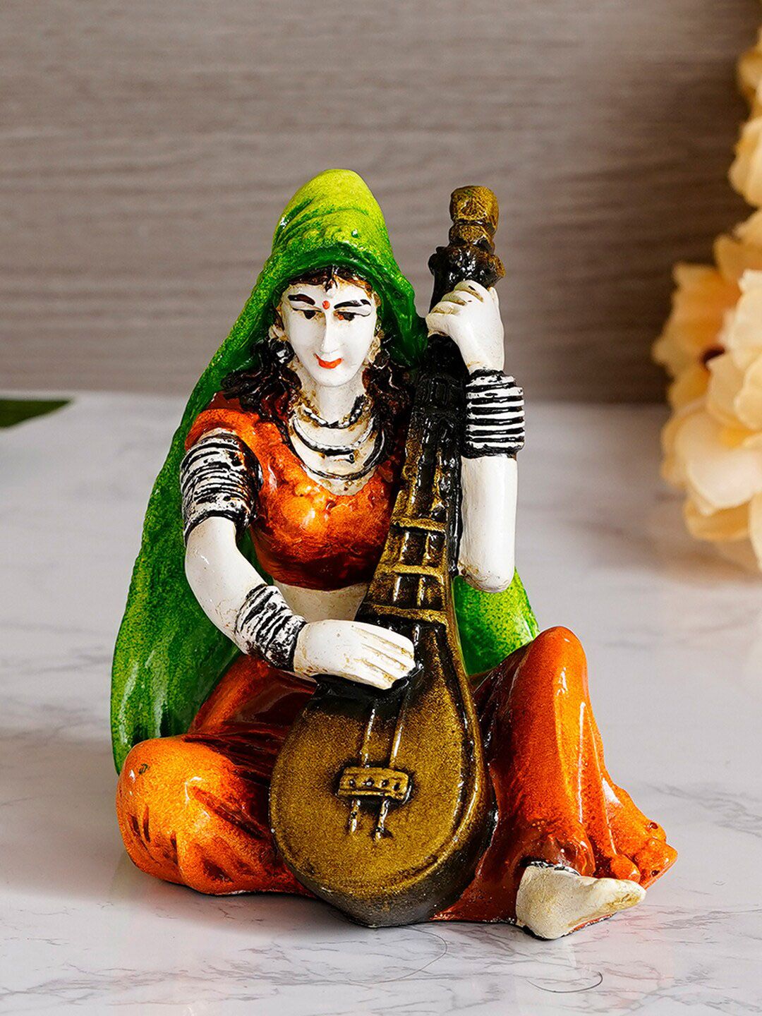 eCraftIndia Green & Orange Rajasthani Lady Playing Sitar Handcrafted Showpiece Price in India