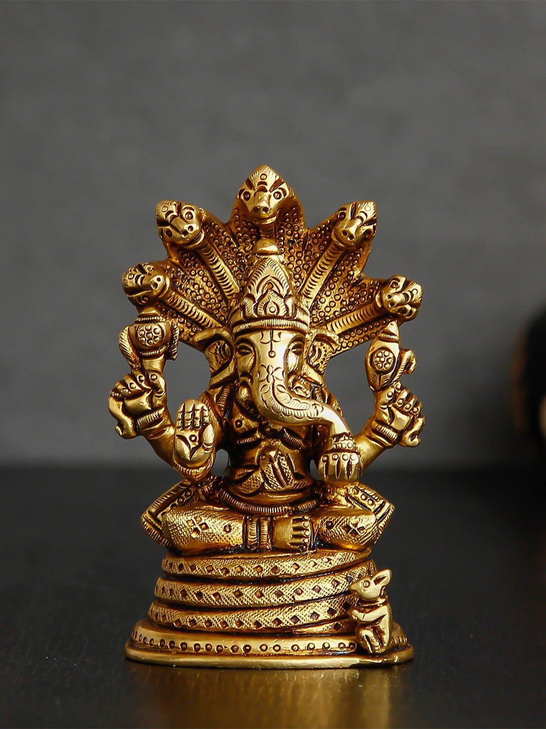 eCraftIndia Gold Lord Ganesha with Naag Devta Decorative Showpiece Price in India