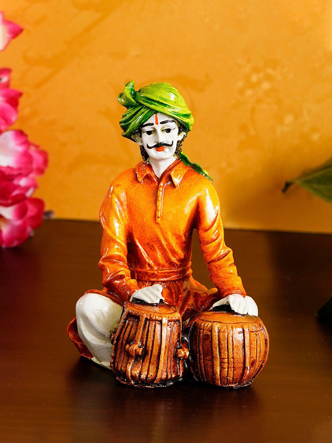 eCraftIndia Orange & Green Handcrafted Rajasthani Man Playing Tabla Polyresin Showpiece Price in India