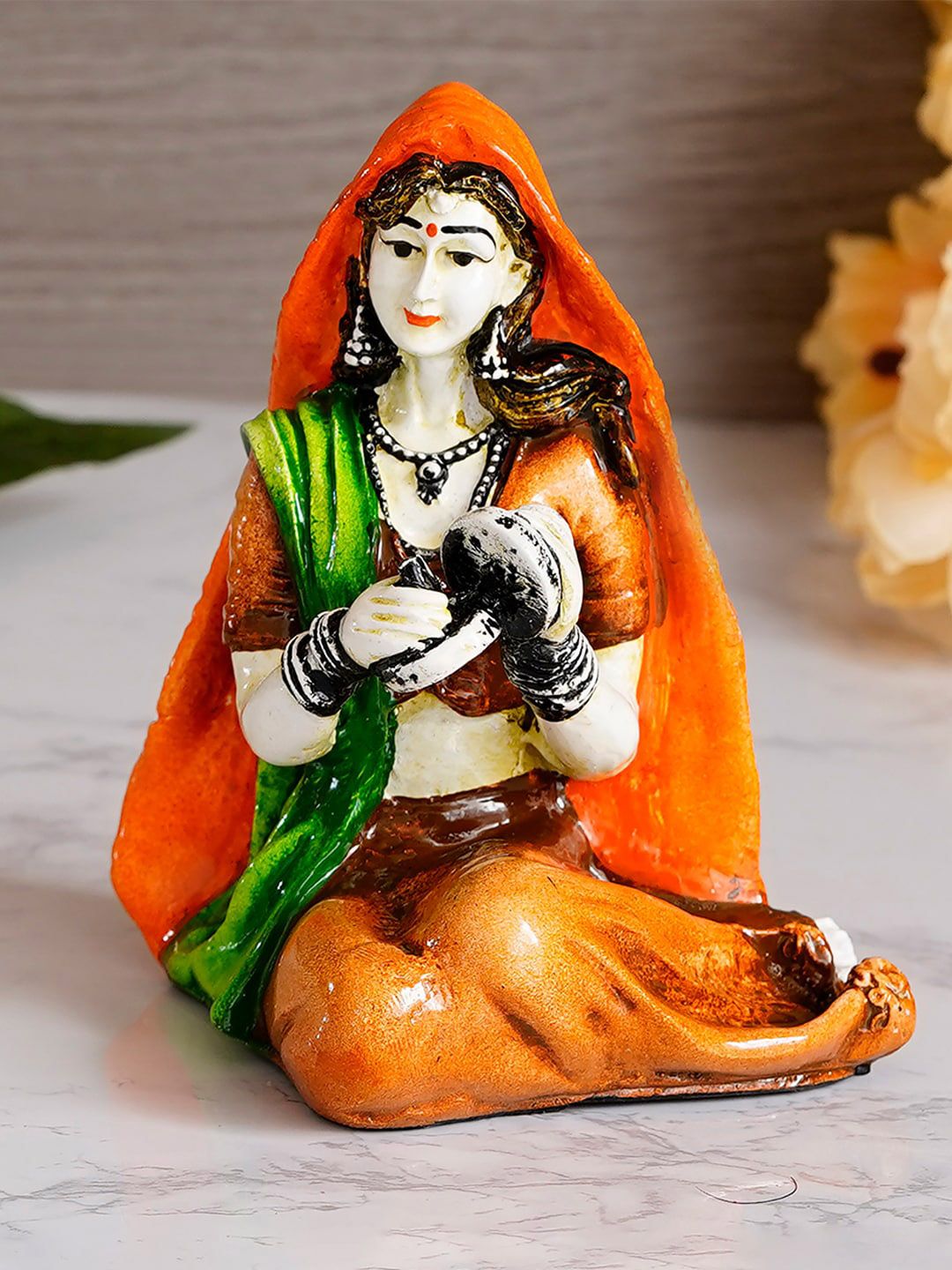 eCraftIndia Green And Orange Colorful Rajasthani Lady Handcrafted Decorative Polyresin Showpiece Price in India