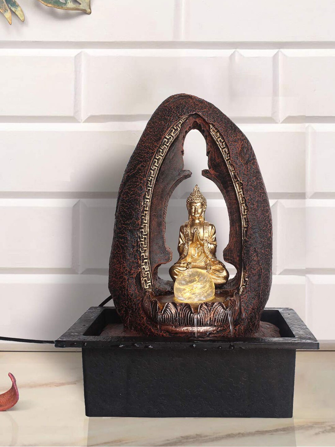 eCraftIndia Gold-Toned & Black Lord Buddha Fountain Price in India