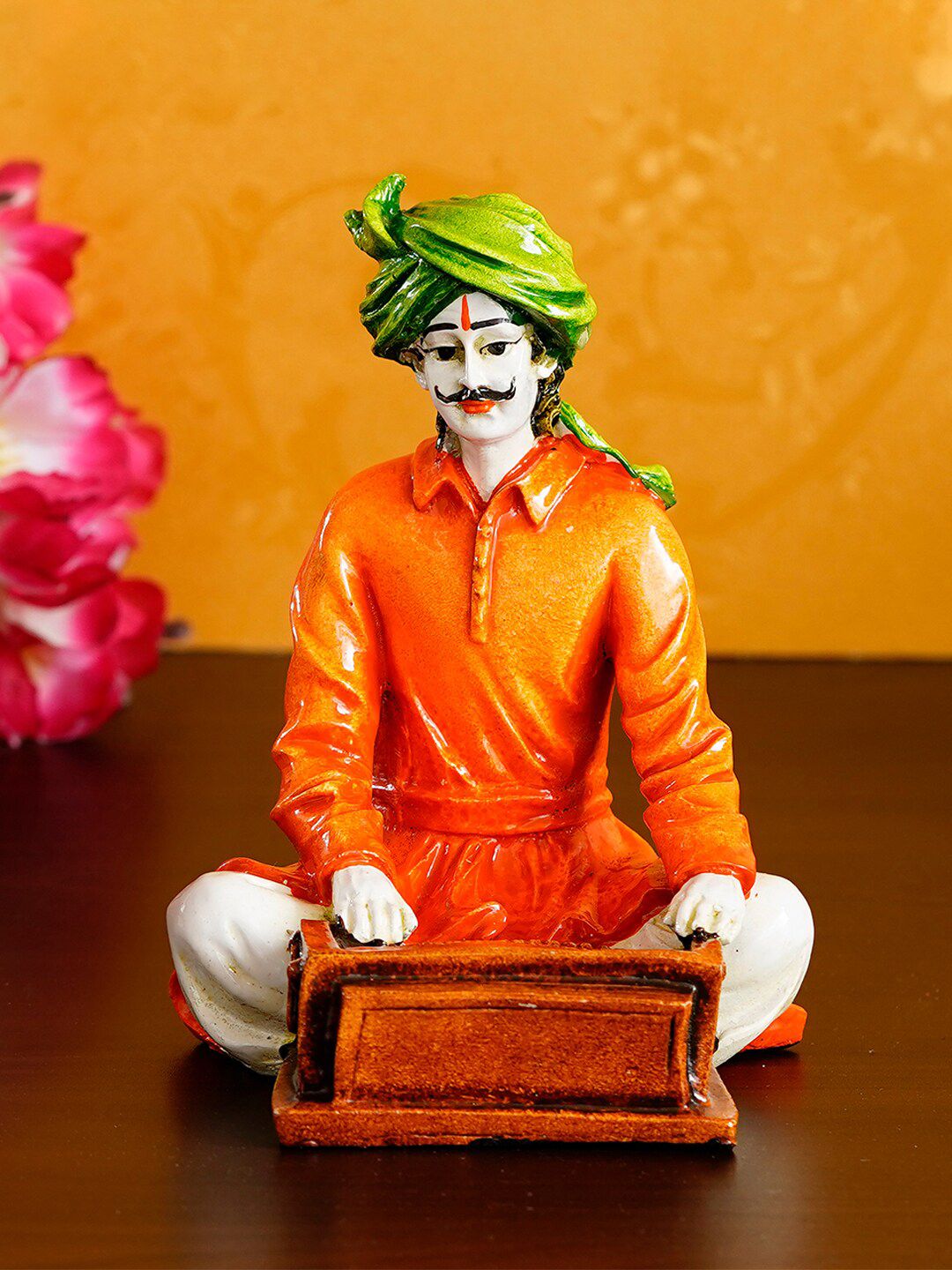 eCraftIndia Green & Orange Handcrafted Rajasthani Man Playing Harmonium Showpiece Price in India