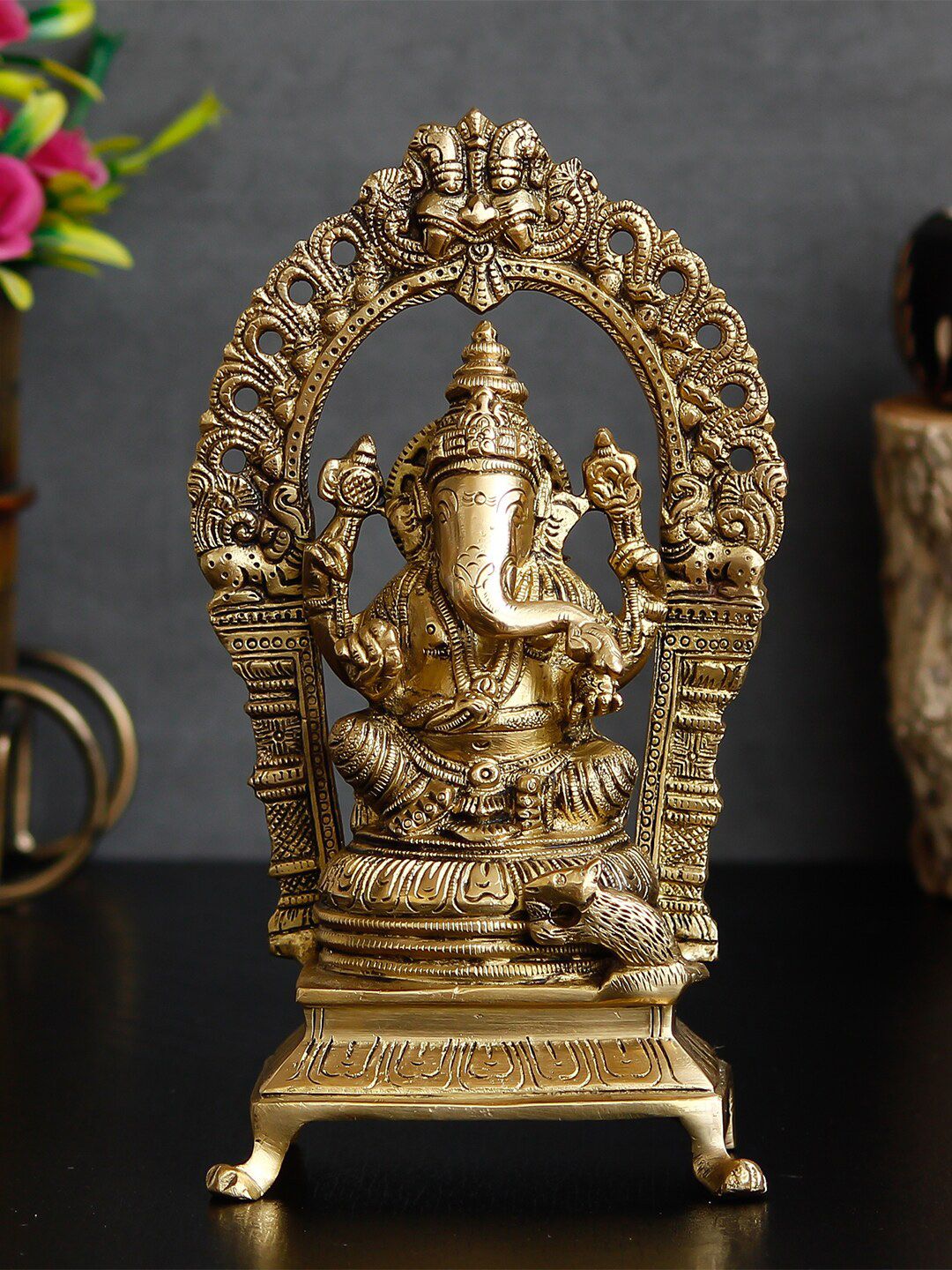 eCraftIndia Gold Toned Handcrafted Lord Ganesha Sitting on Throne Showpiece Price in India