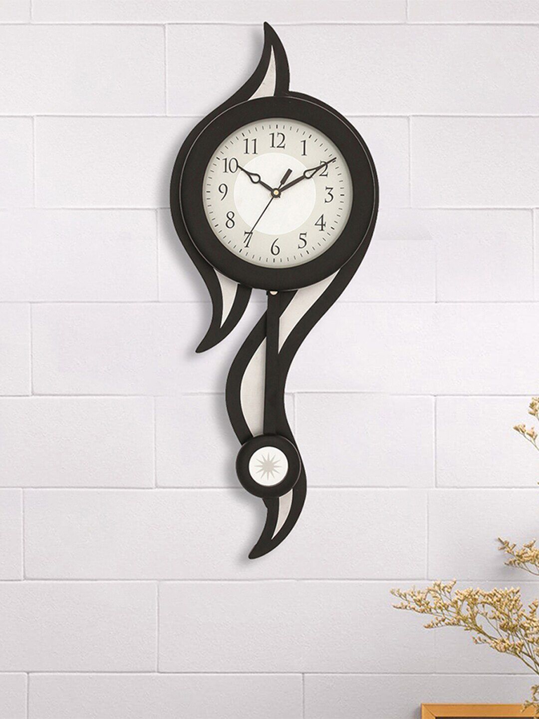 eCraftIndia Black & Off White Abstract Shaped Pendulum Traditional Wall Clock Price in India