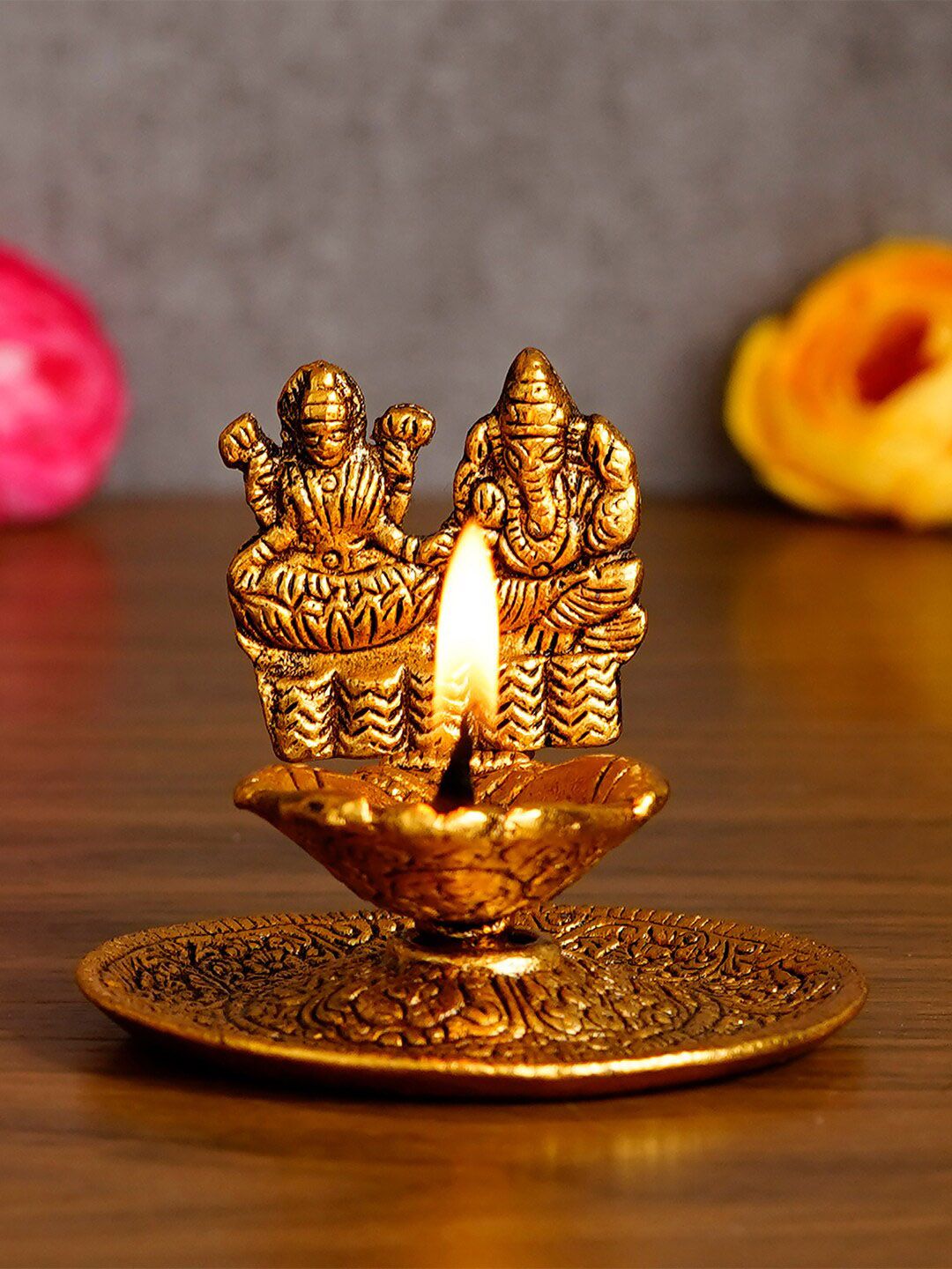 eCraftIndia Handcrafted Goddess Laxmi & Lord Ganesha Golden Metal Diya Showpiece Price in India