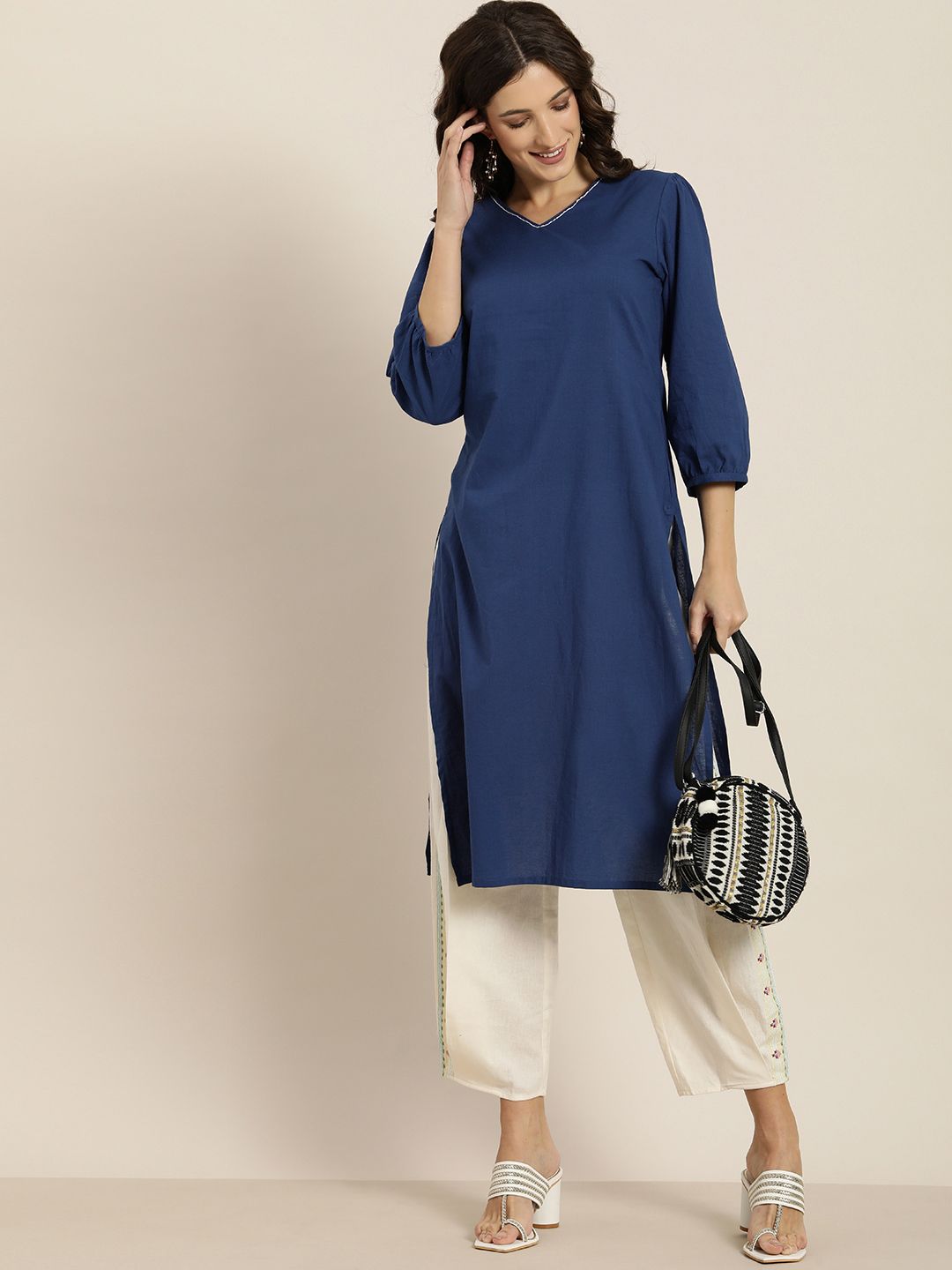 Moda Rapido Women Navy Blue Solid Pure Cotton Kurta with Puff Sleeves Price in India