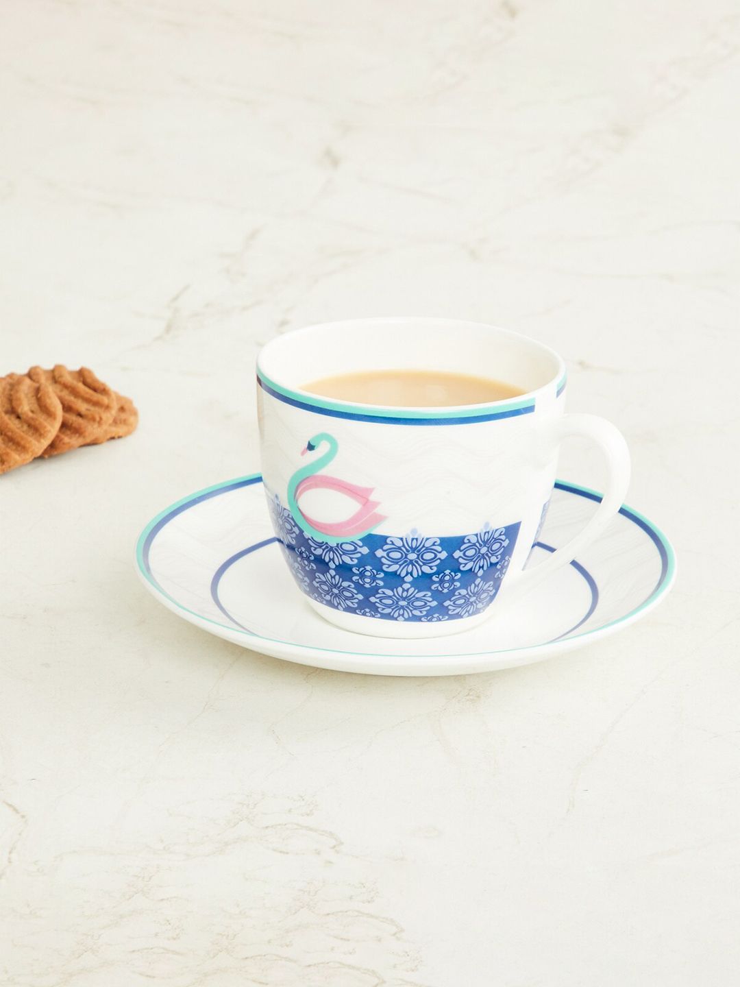 Home Centre White & Blue Printed Bone China Glossy Cups and Saucers Set of Cups and Mugs Price in India