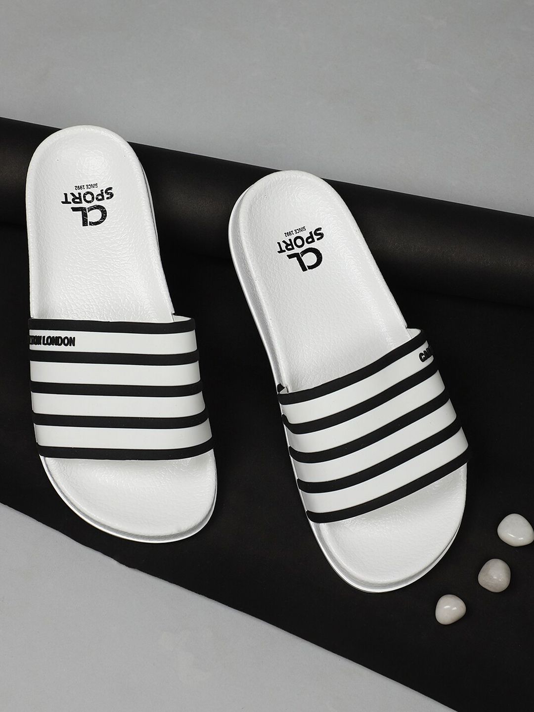 Carlton London sports Women White & Black Striped Sliders Price in India