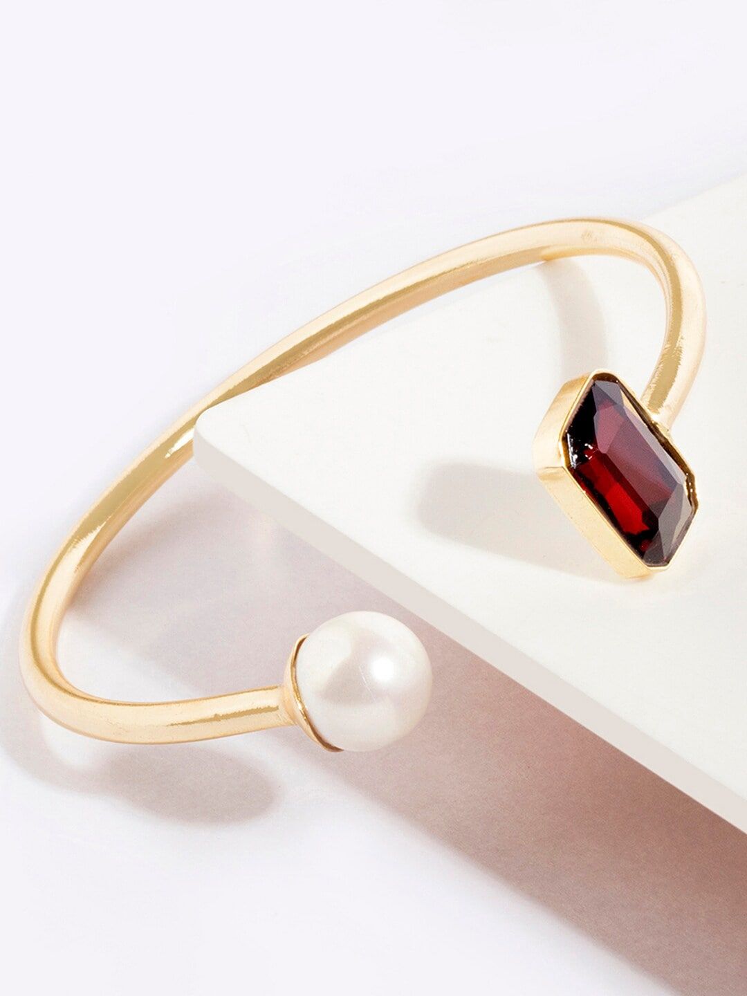 Mikoto by FableStreet Women Gold-Toned & Octagonal Red Crystal & Pearl Cuff Bracelet Price in India