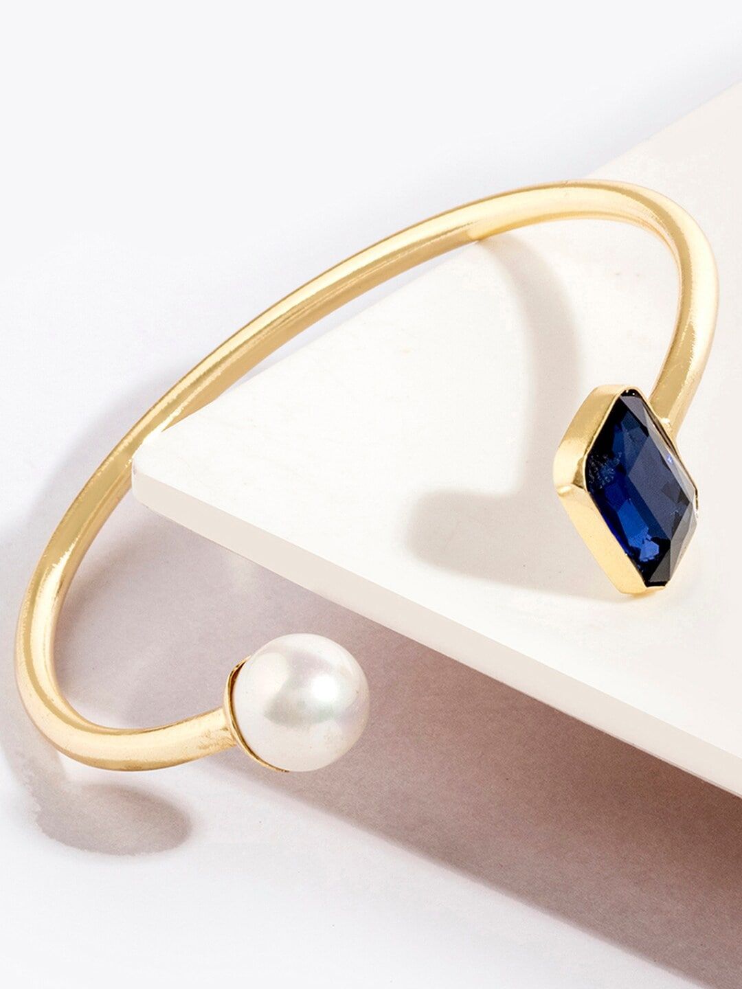 Mikoto by FableStreet Women Gold & Blue Brass Crystals & Pearl Gold-Plated Cuff Bracelet Price in India