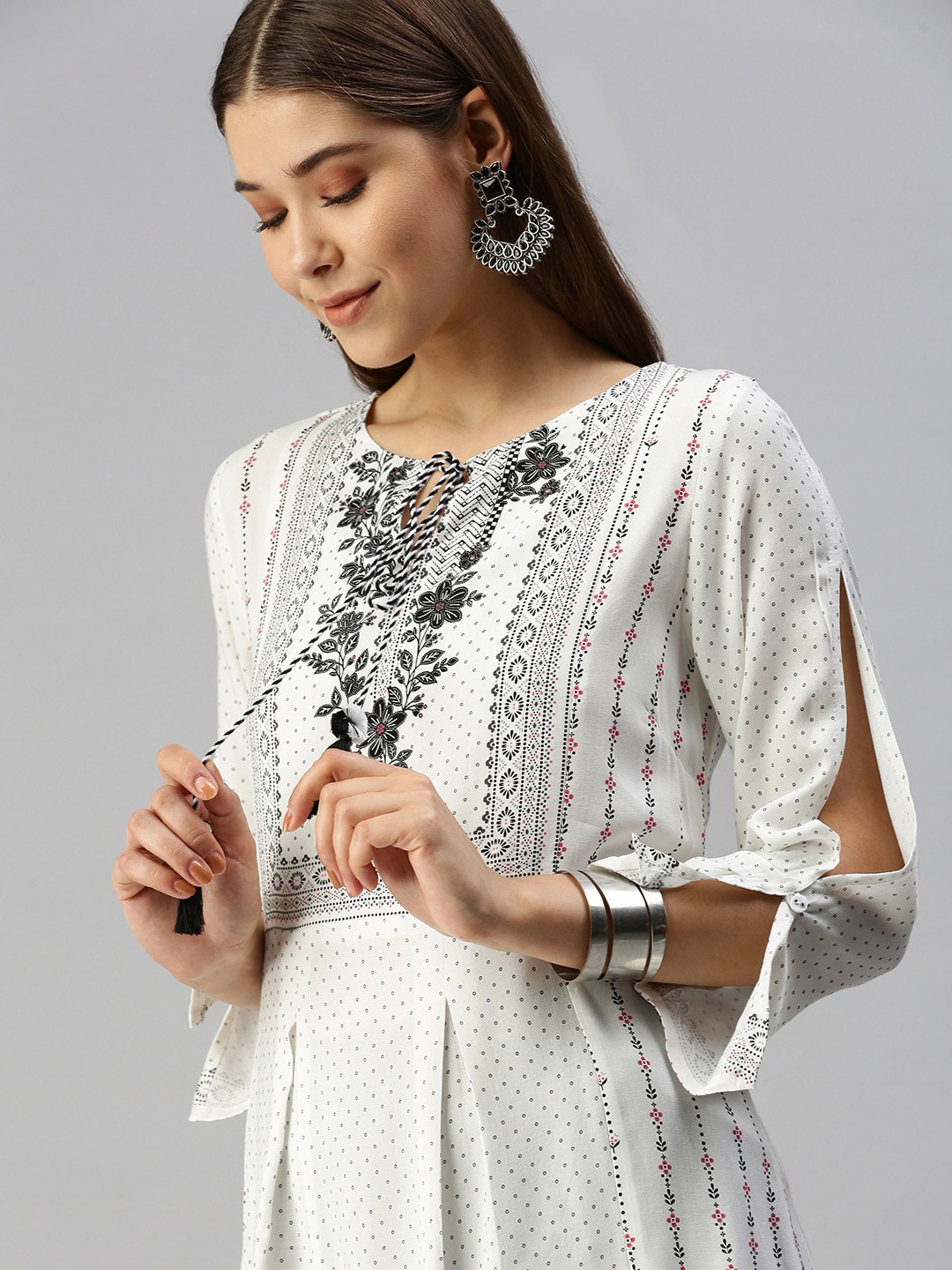 Global Desi Women White & Black Printed Tunic With Tie-Ups Detail Price in India