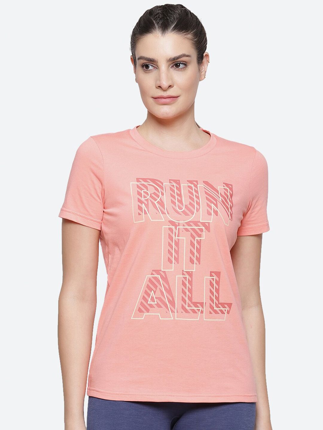 ASICS Women Pink & Off White Typography Printed W HERITAGE FONT GRAPHIC 1 Gym T-shirt Price in India