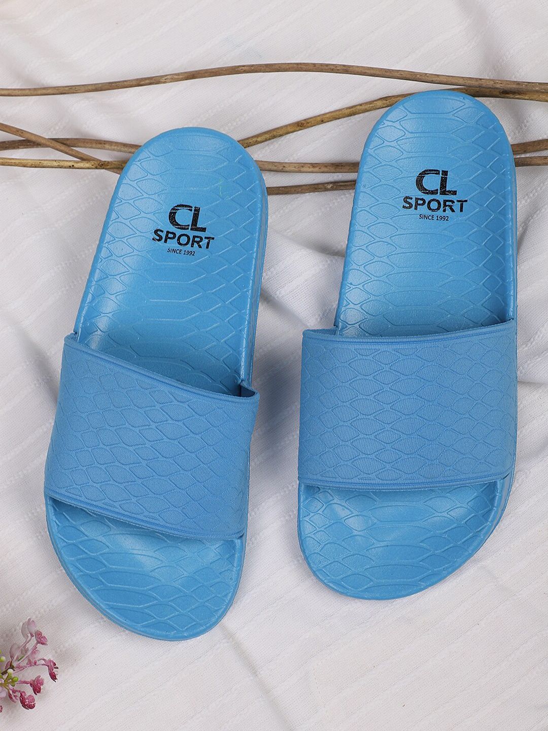 Carlton London sports Women Blue Textured Sliders Price in India