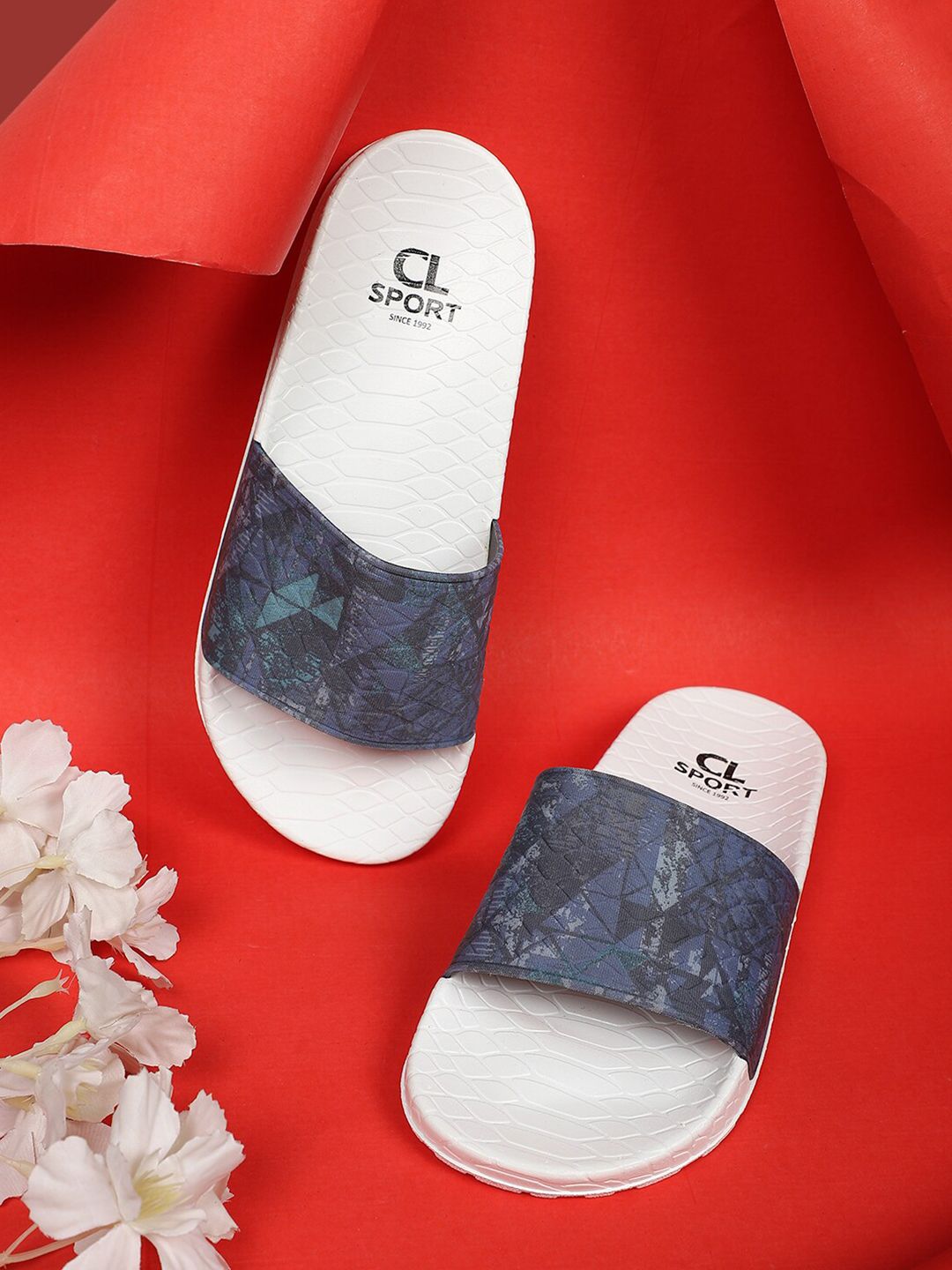 Carlton London sports Women Navy Blue & White Printed Sliders Price in India